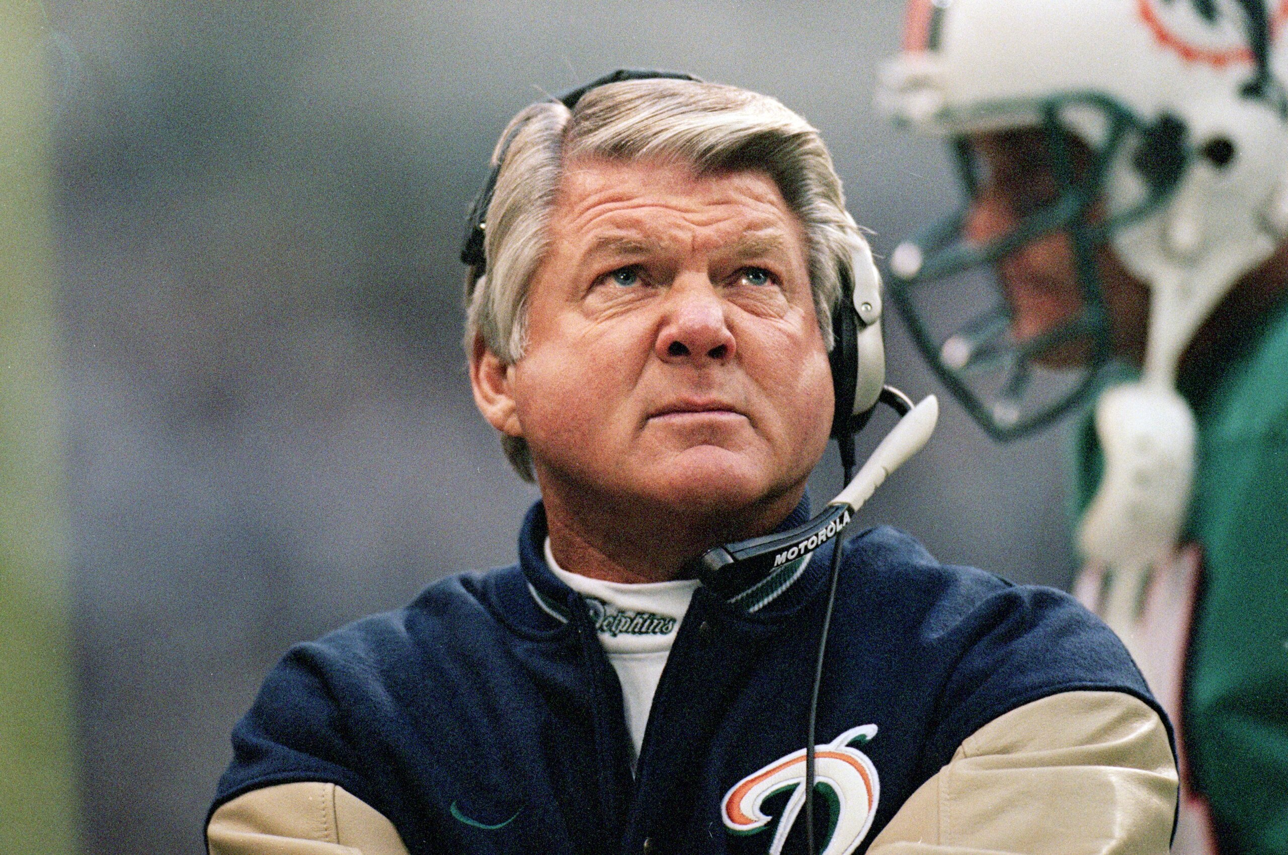 25 Nov 1999:  Head coach Jimmy Johnson  of the Miami Dolphins looks at the scoreboard during the game against the Dallas Cowboys  at the Texas Stadium in Irving, Texas. The Cowboys defeated the Dolphins 20-3. Mandatory Credit: Ronald Martinez  /Allsport