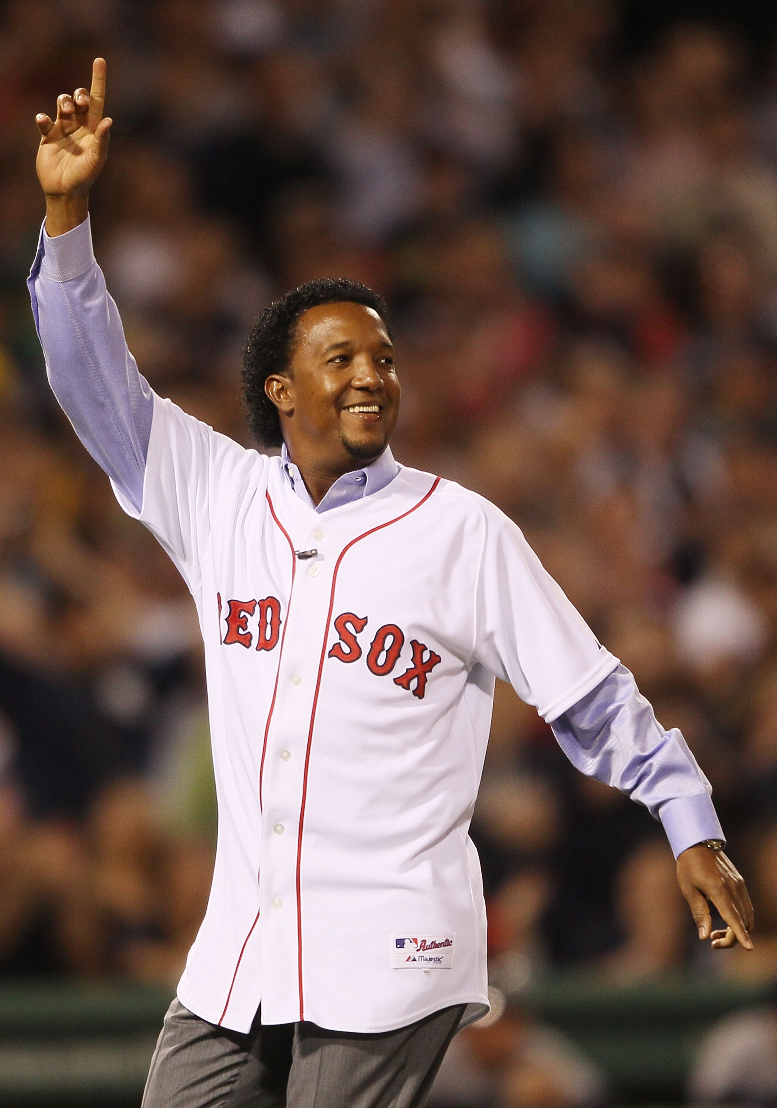 BOSTON - APRIL 04:  Former the Boston Red Sox pitcher Pedro Martinez greets the fans before the game against the New York Yankees on April 4, 2010 during Opening Night at Fenway Park in Boston, Massachusetts.  (Photo by Elsa/Getty Images)