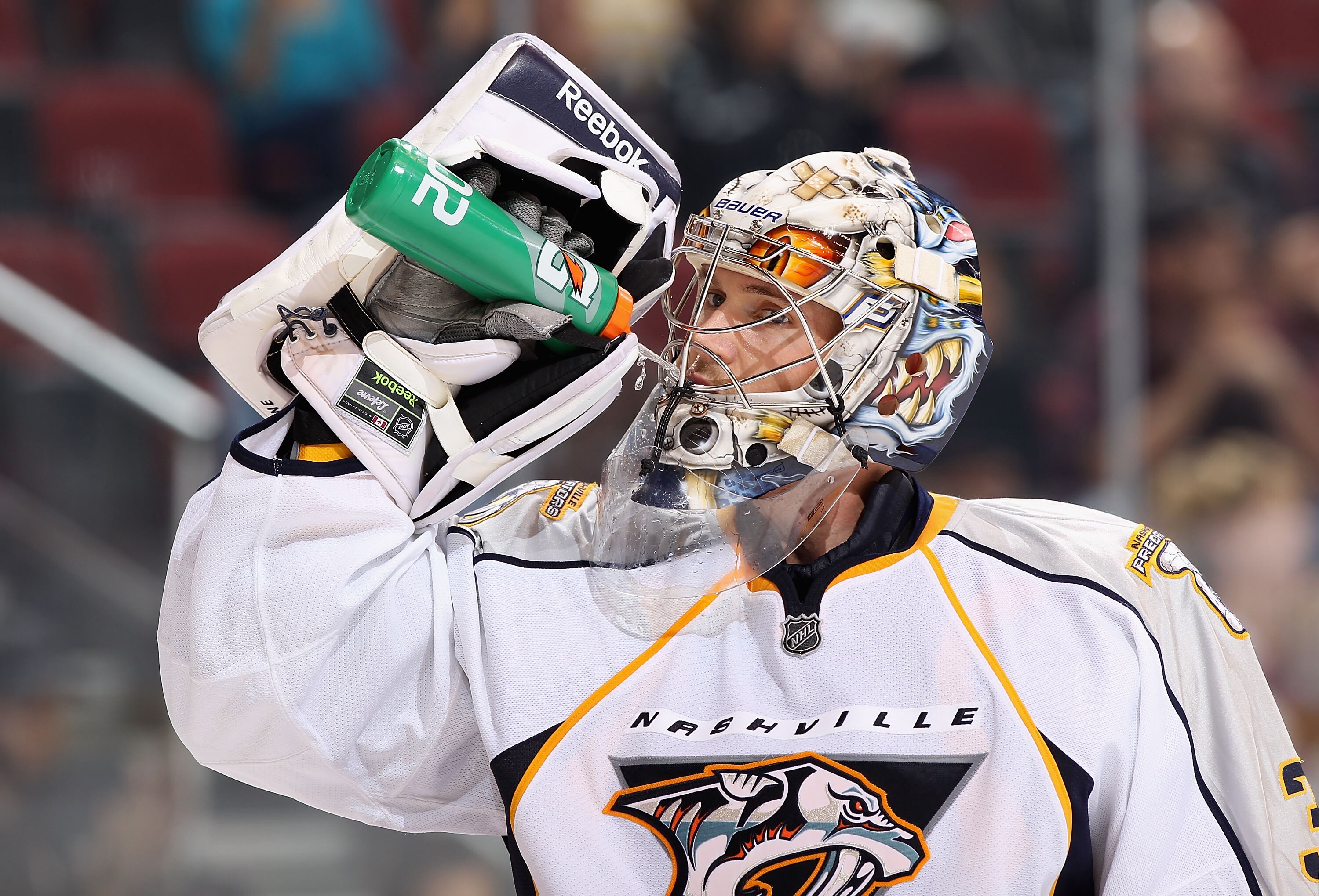 GLENDALE, AZ - NOVEMBER 03:  Goaltender Pekka Rinne #35 of the Nashville Predators drinks water from a gatorade bottle during the NHL game against the Phoenix Coyotes at Jobing.com Arena on November 3, 2010 in Glendale, Arizona.  The Coyotes defeated the