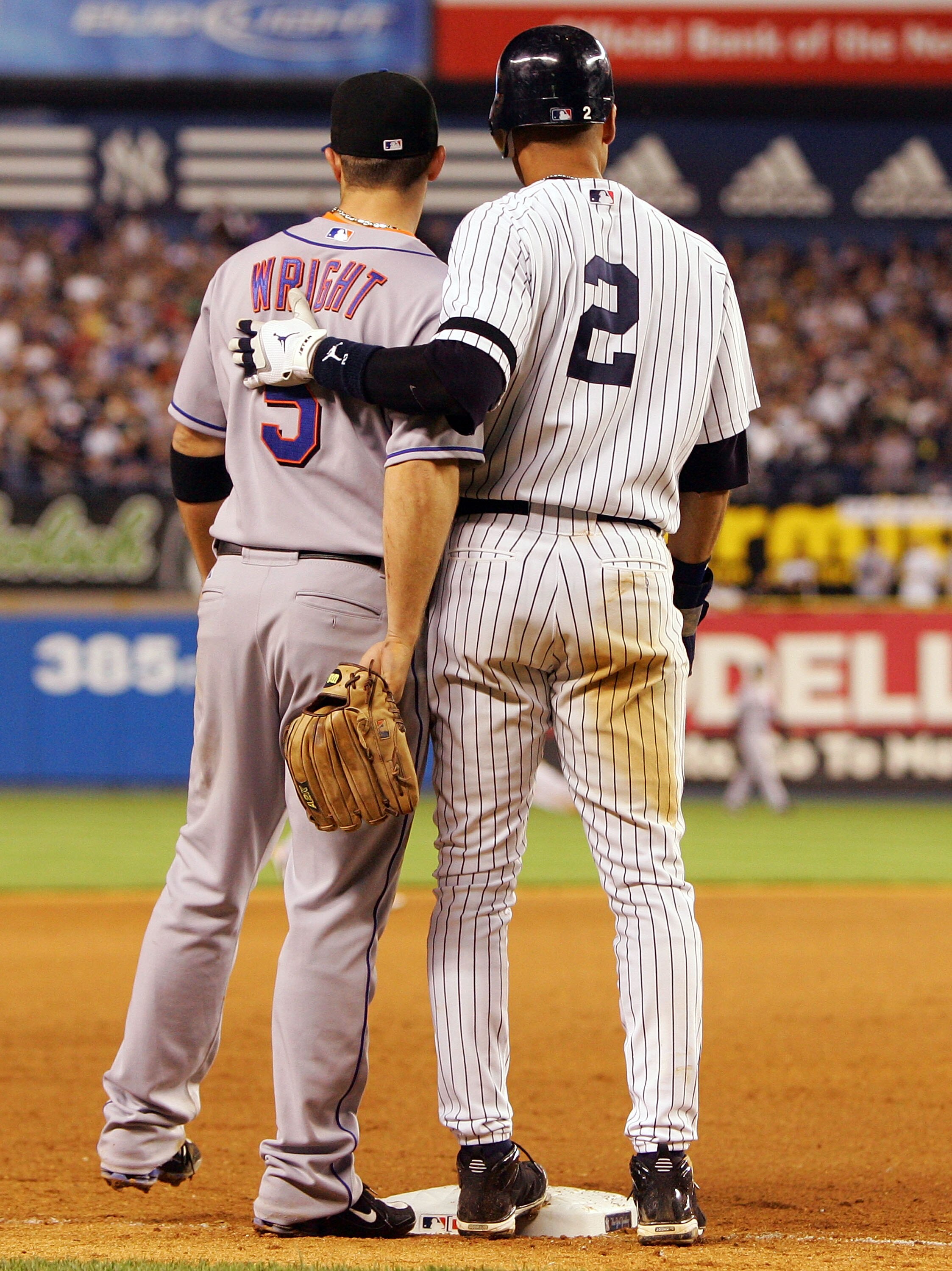 NEW YORK - JUNE 15:  Derek Jeter #2 of the New York Yankees pats David Wright #5 of the New York Mets on the back during a break at Yankee Stadium on June 15, 2007 in the Bronx borough of New York City.  (Photo by Jim McIsaac/Getty Images)