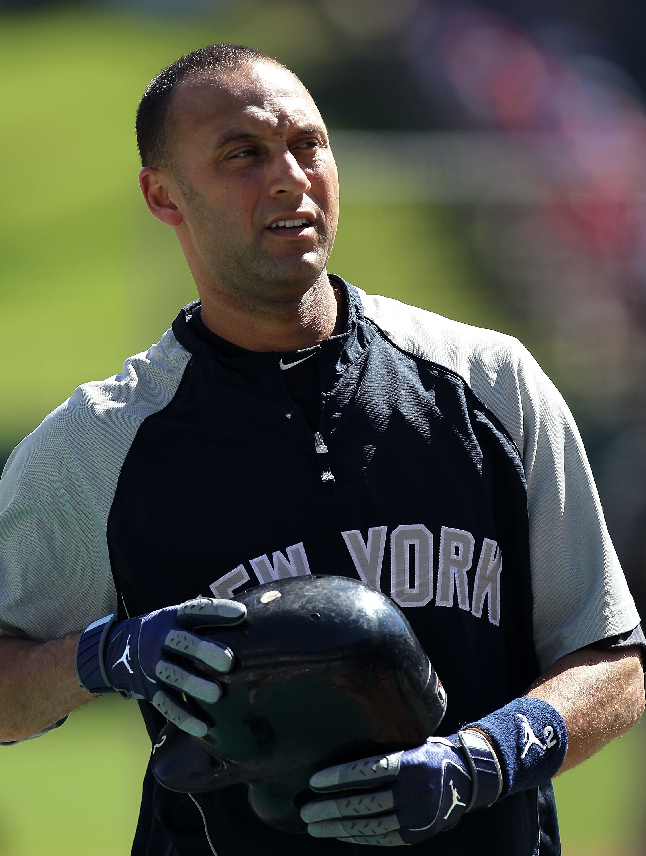 ARLINGTON, TX - OCTOBER 16:  Derek Jeter #2 of the New York Yankees looks on during batting practice against the Texas Rangers in Game Two of the ALCS during the 2010 MLB Playoffs at Rangers Ballpark in Arlington on October 16, 2010 in Arlington, Texas.