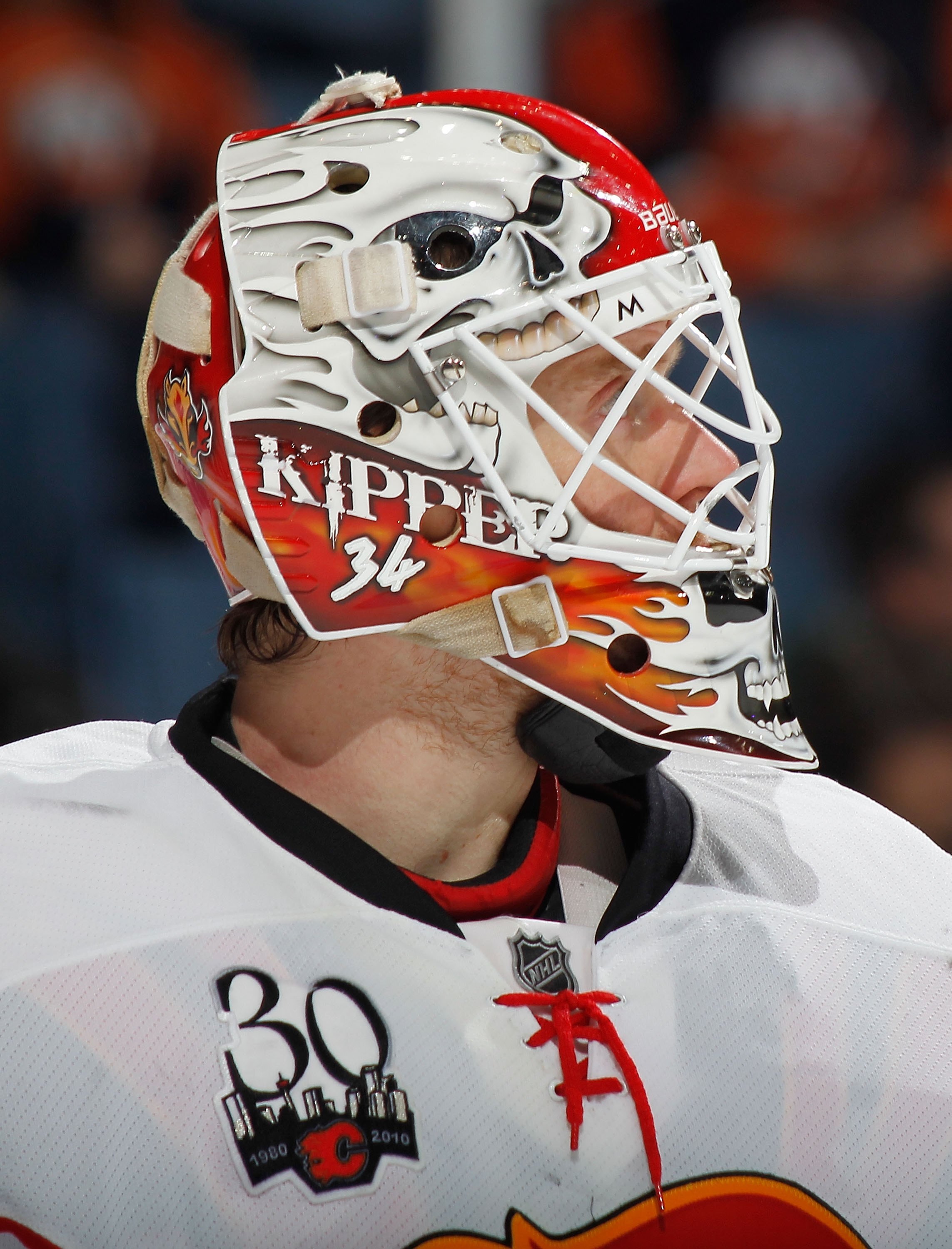 UNIONDALE, NY - MARCH 25:  Goalie Miikka Kiprusoff #34 of the Calgary Flames looks on during a break in play against the New York Islanders during an NHL game at the Nassau Coliseum on March 25, 2010 in Uniondale, New York.  (Photo by Paul Bereswill/Getty