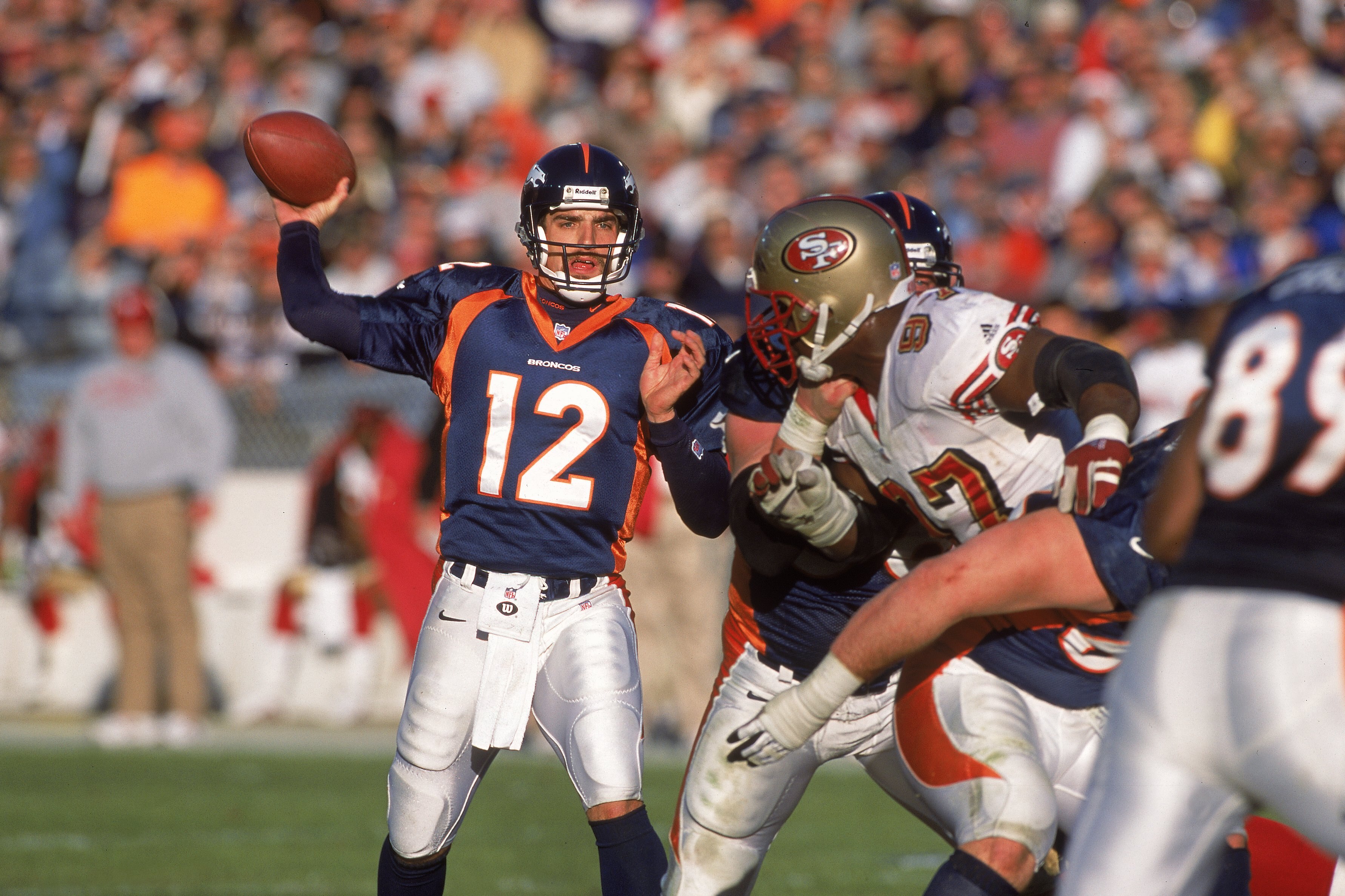 23 Dec 2000:  Gus Frerotte #12 of the Denver Broncos lines up a pass during the game against the San Francisco 49ers at the Mile High Stadium in Denver, Colorado. The Broncos defeated the 49ers 38-9.Mandatory Credit: Harry How  /Allsport