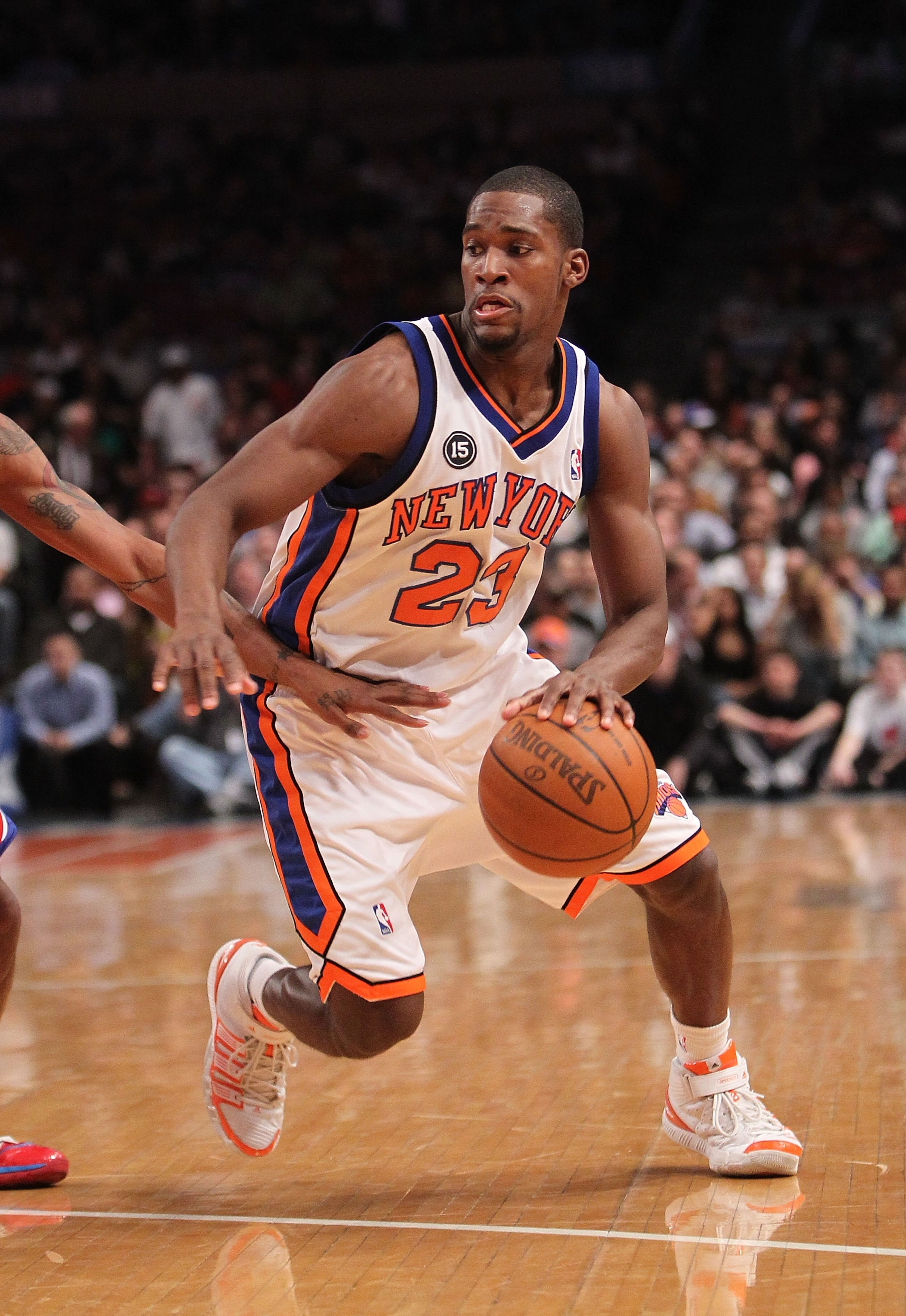NEW YORK - MARCH 19: Toney Douglas #23 of the New York Knicks against the Philadelphia 76ers at Madison Square Garden on March 19, 2010 in New York City. NOTE TO USER: User expressly acknowledges and agrees that, by downloading and or using this photogra NEW YORK - MARCH 19: Toney Douglas #23 of the New York Knicks against the Philadelphia 76ers at Madison Square Garden on March 19, 2010 in New York City. NOTE TO USER: User expressly acknowledges and agrees that, by downloading and or using this photogra