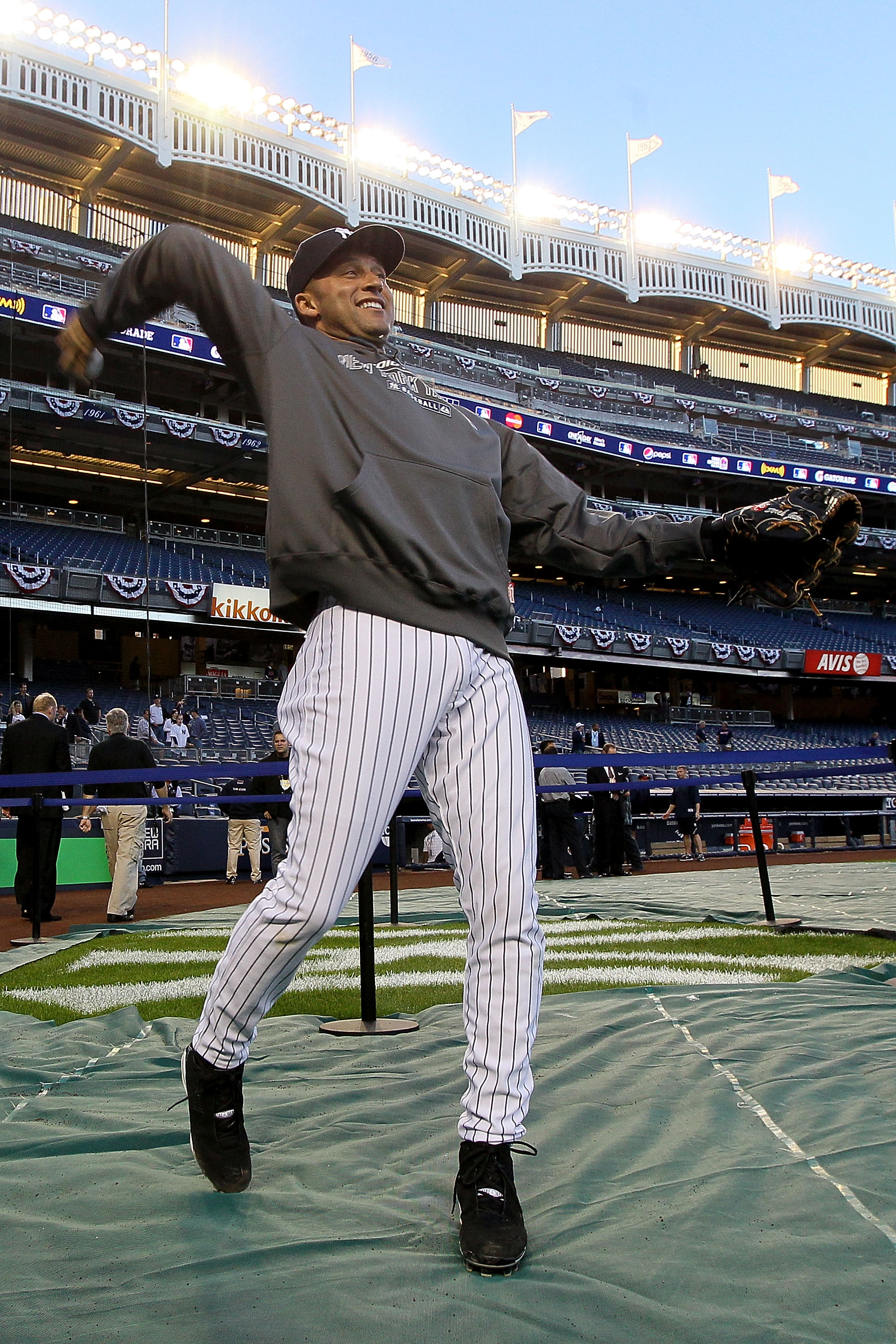 NEW YORK - OCTOBER 09:  Derek Jeter #2 of the New York Yankees warms up against the Minnesota Twins during Game Three of the ALDS part of the 2010 MLB Playoffs at Yankee Stadium on October 9, 2010 in the Bronx borough of New York City.  (Photo by Jim McIs