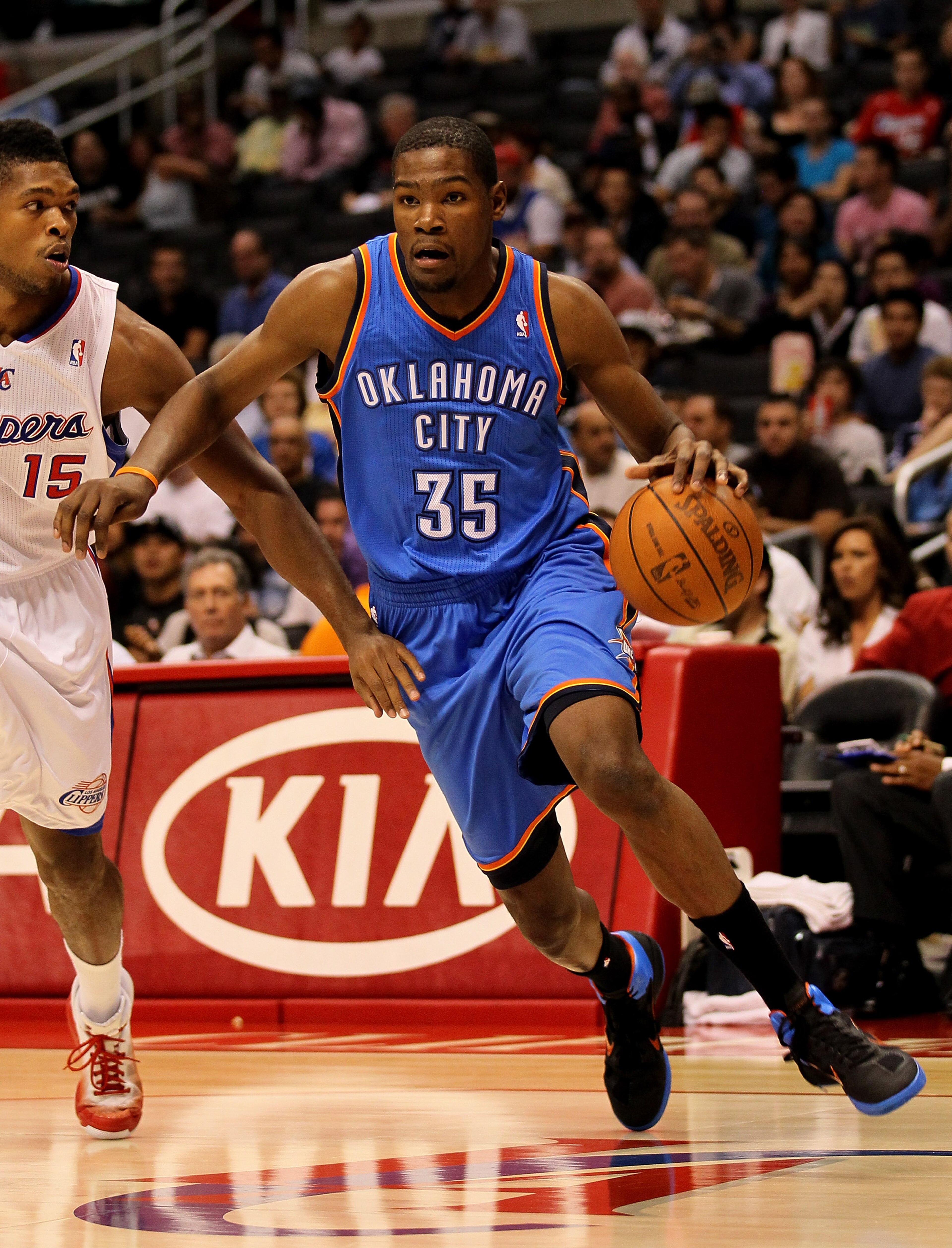 LOS ANGELES - NOVEMBER 3: Kevin Durant #32 of the Oklahoma City Thunder drives past Ryan Gomes #15 of the Los Angeles Clippers at Staples Center on November 3, 2010 in Los Angeles, California. NOTE TO USER: User expressly acknowledges and agrees that, b LOS ANGELES - NOVEMBER 3: Kevin Durant #32 of the Oklahoma City Thunder drives past Ryan Gomes #15 of the Los Angeles Clippers at Staples Center on November 3, 2010 in Los Angeles, California. NOTE TO USER: User expressly acknowledges and agrees that, b