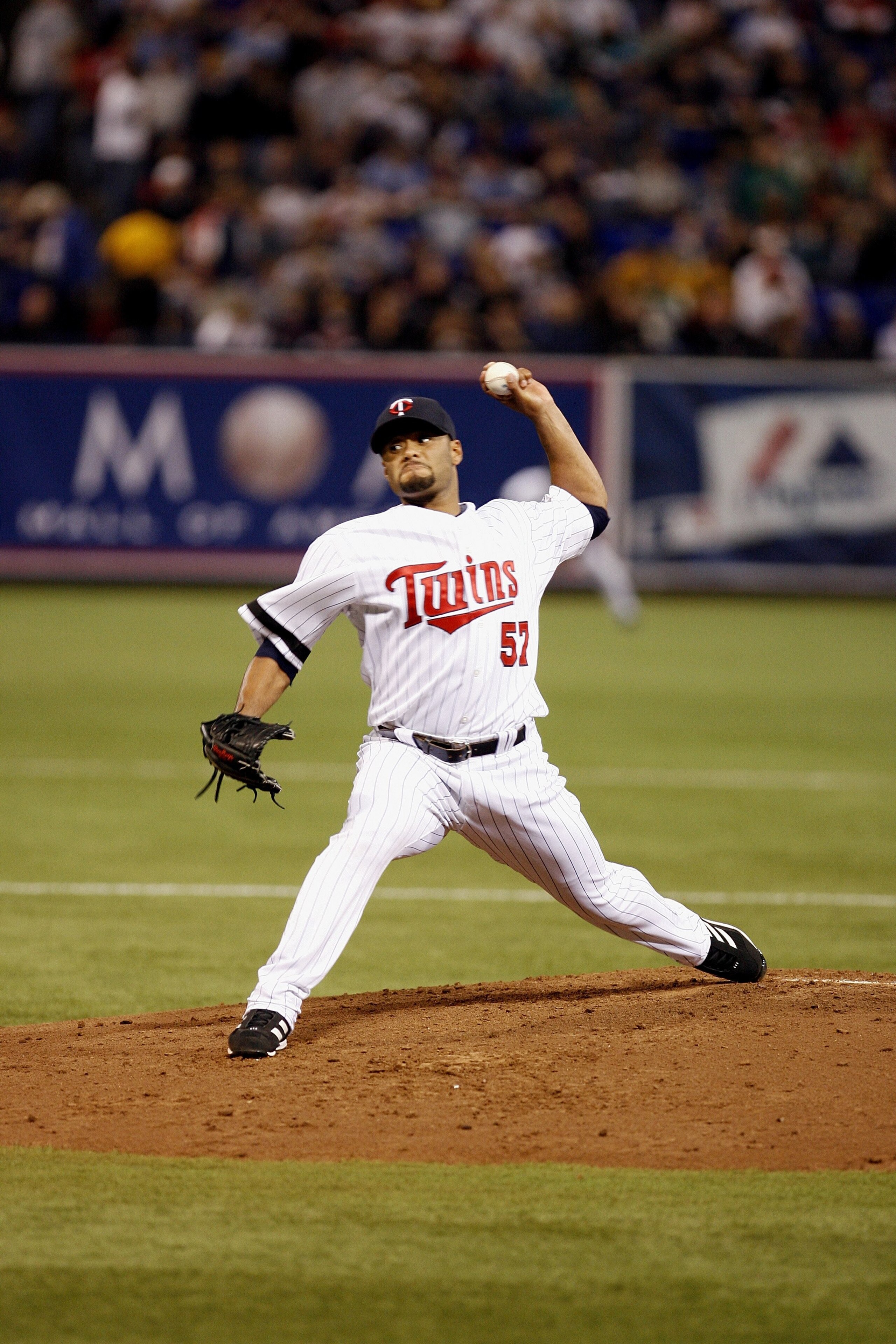 MINNEAPOLIS, MN - APRIL 2:  Johan Santana #57 of the Minnesota Twins pitches against the Baltimore Orioles during the Opening Day game on April 2, 2007 at the Metrodome in Minneapolis, Minnesota.  The Twins won 7-4.  (Photo by Scott A. Schneider/Getty Ima