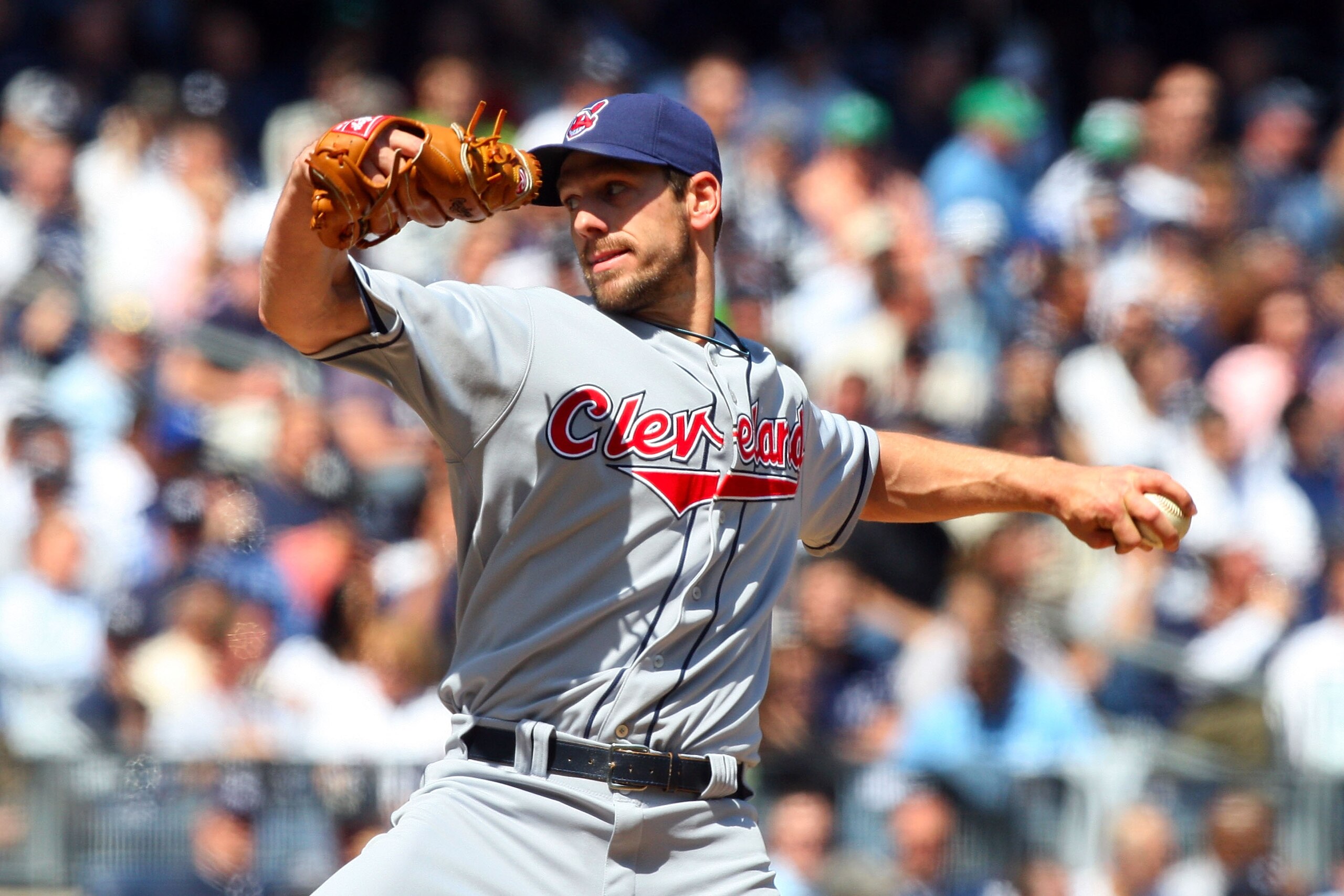 NEW YORK - APRIL 16:  Cliff Lee #31 of the Cleveland Indians pitches against the New York Yankees during opening day at the new Yankee Stadium on April 16, 2009 in the Bronx borough of New York City. This is the first regular season MLB game being played 