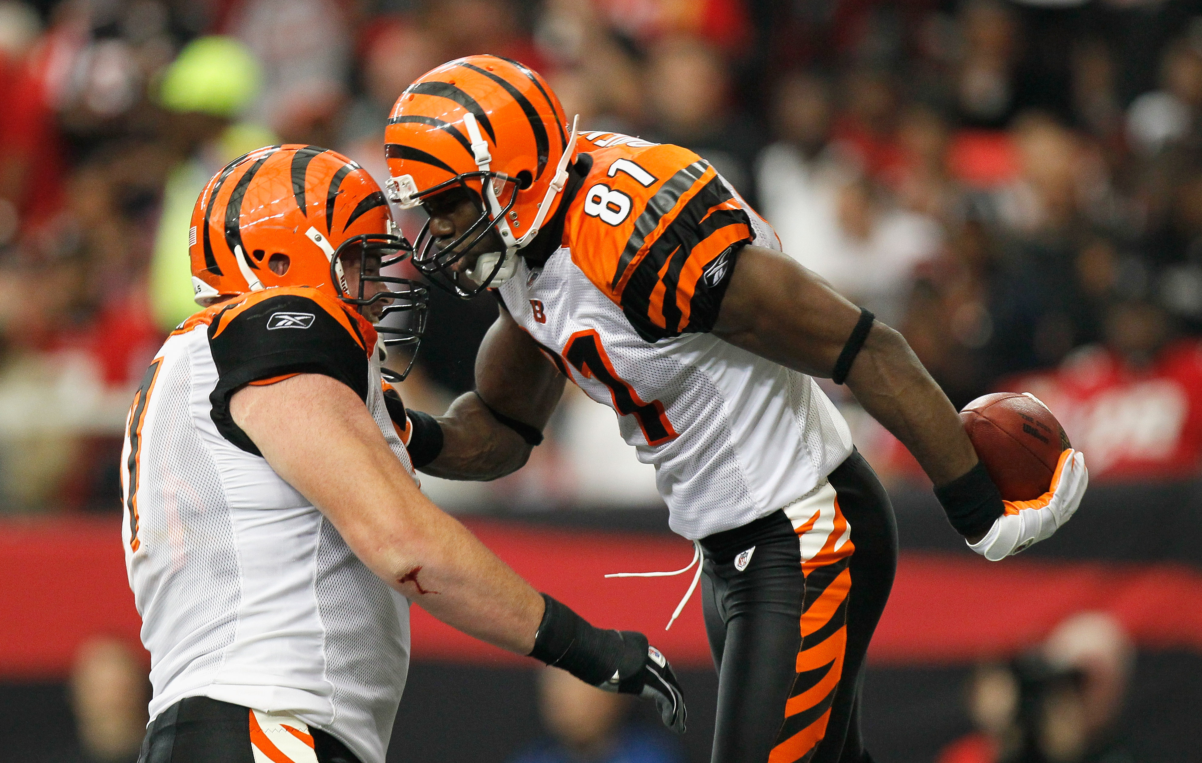 ATLANTA - OCTOBER 24:  Terrell Owens #81 of the Cincinnati Bengals celebrates his touchdown against the Atlanta Falcons with Andrew Whitworth #77 at Georgia Dome on October 24, 2010 in Atlanta, Georgia.  (Photo by Kevin C. Cox/Getty Images)