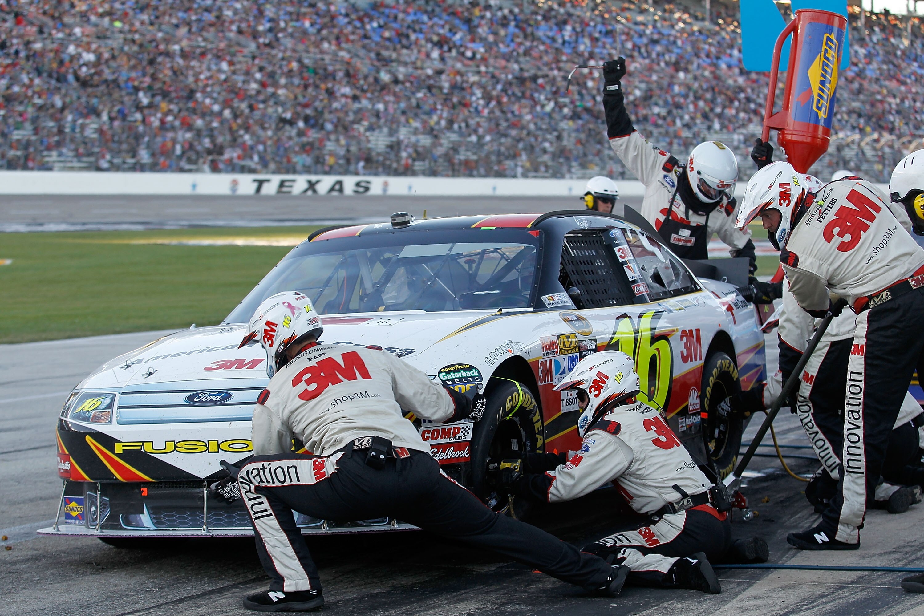 FORT WORTH, TX - NOVEMBER 07:  Greg Biffle, driver of the #16 American Red Cross Ford, makes a pit stop during the NASCAR Sprint Cup Series AAA Texas 500 at Texas Motor Speedway on November 7, 2010 in Fort Worth, Texas.  (Photo by Todd Warshaw/Getty Image