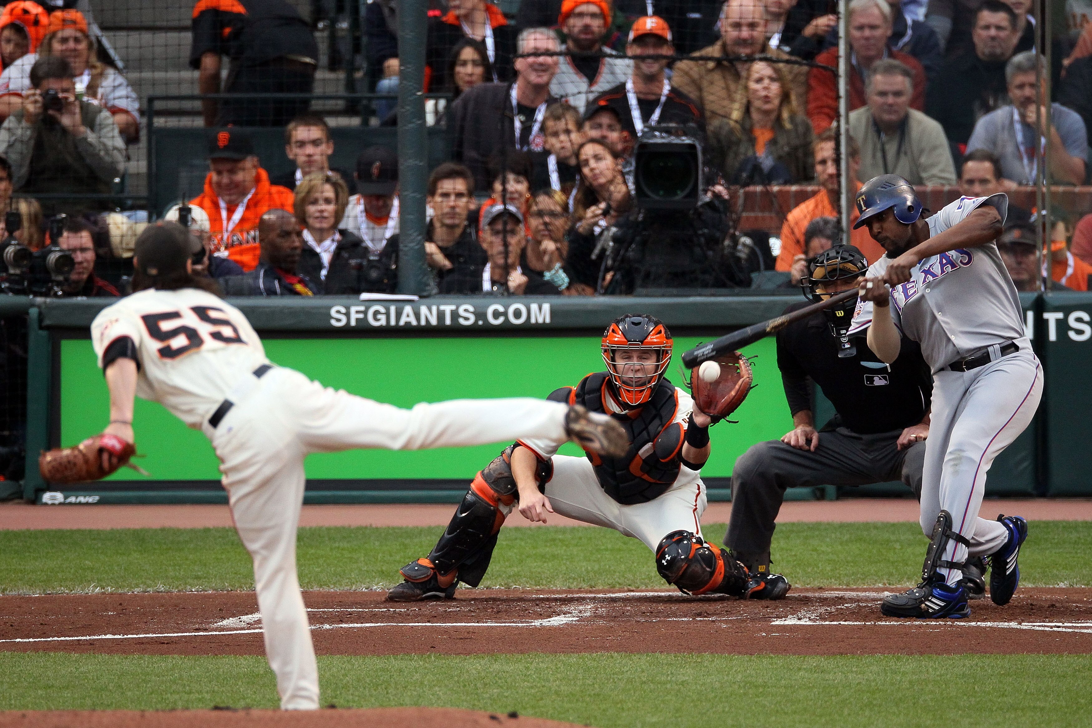 SAN FRANCISCO - OCTOBER 27:  Vladimir Guerrero #27 of the Texas Rangers hits an RBI single in the first inning against Tim Lincecum #55 of the San Francisco Giants in Game One of the 2010 MLB World Series at AT&T Park on October 27, 2010 in San Francisco,