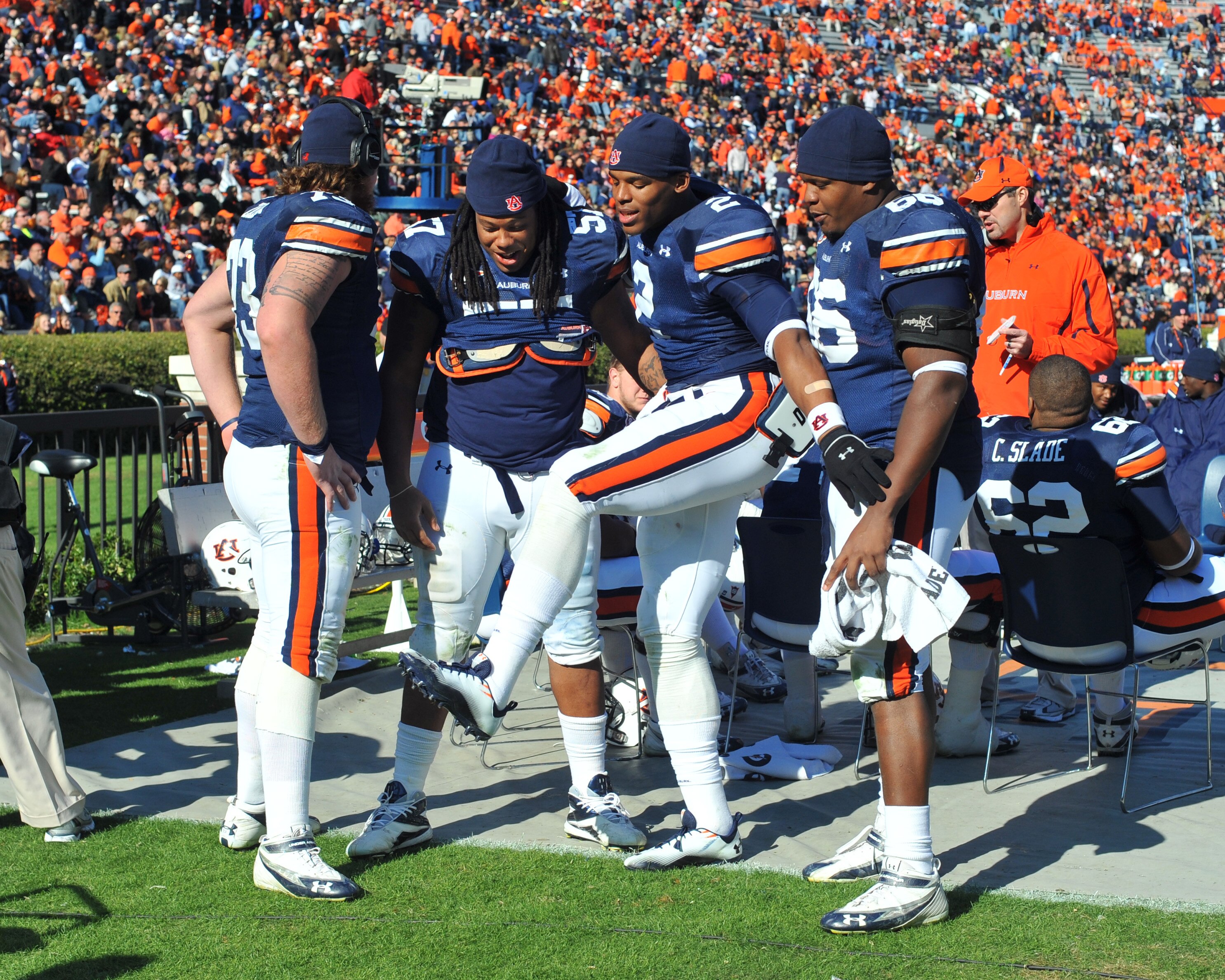 AUBURN, AL - NOVEMBER 6:  Quarterback Cam Newton #2 of the Auburn Tigers shows his teammates how he scored against the Chattanooga Mocs November 6, 2010 at Jordan-Hare Stadium in Auburn, Alabama.  (Photo by Al Messerschmidt/Getty Images)