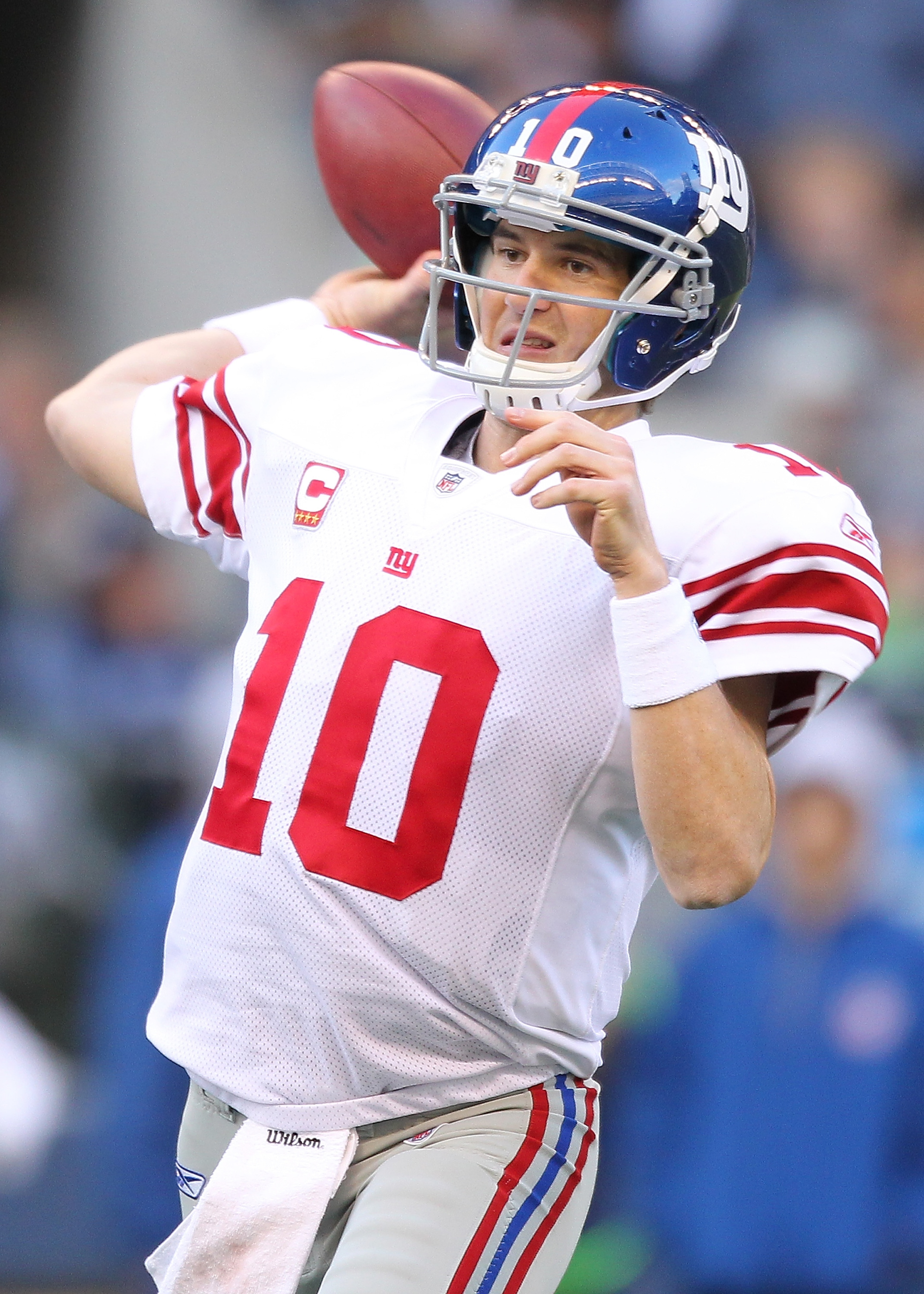 SEATTLE - NOVEMBER 07:  Quarterback Eli Manning #10 of the New York Giants passes against the Seattle Seahawks at Qwest Field on November 7, 2010 in Seattle, Washington. The Giants defeated the Seahawks 41-7. (Photo by Otto Greule Jr/Getty Images)