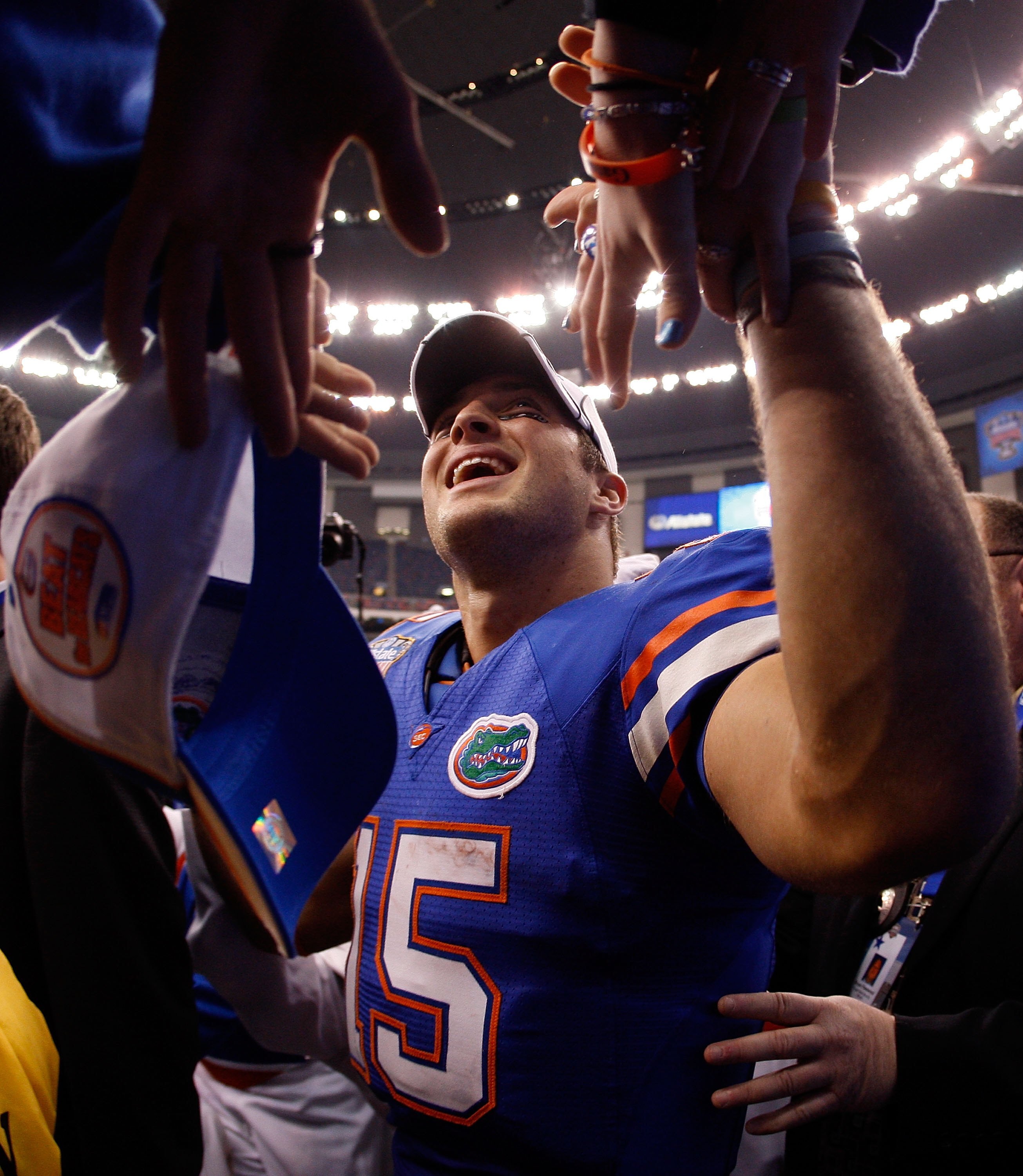 NEW ORLEANS - JANUARY 01:  Tim Tebow #15 of the Florida Gators walks off the field after defeating the Cincinnati Bearcats 51-24 in the Allstate Sugar Bowl at the Louisana Superdome on January 1, 2010 in New Orleans, Louisiana.   (Photo by Chris Graythen/