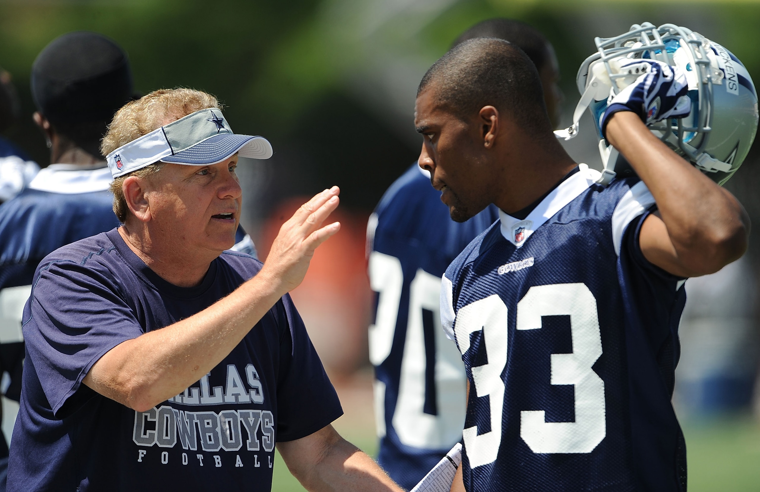 CARROLLTON, TX - JUNE 16:  Secondary coach Dave Campo and Mike Mickens #33 of the Dallas Cowboys during mini camp at Standridge Stadium on June 16, 2009 in Carrollton, Texas.  (Photo by Ronald Martinez/Getty Images)