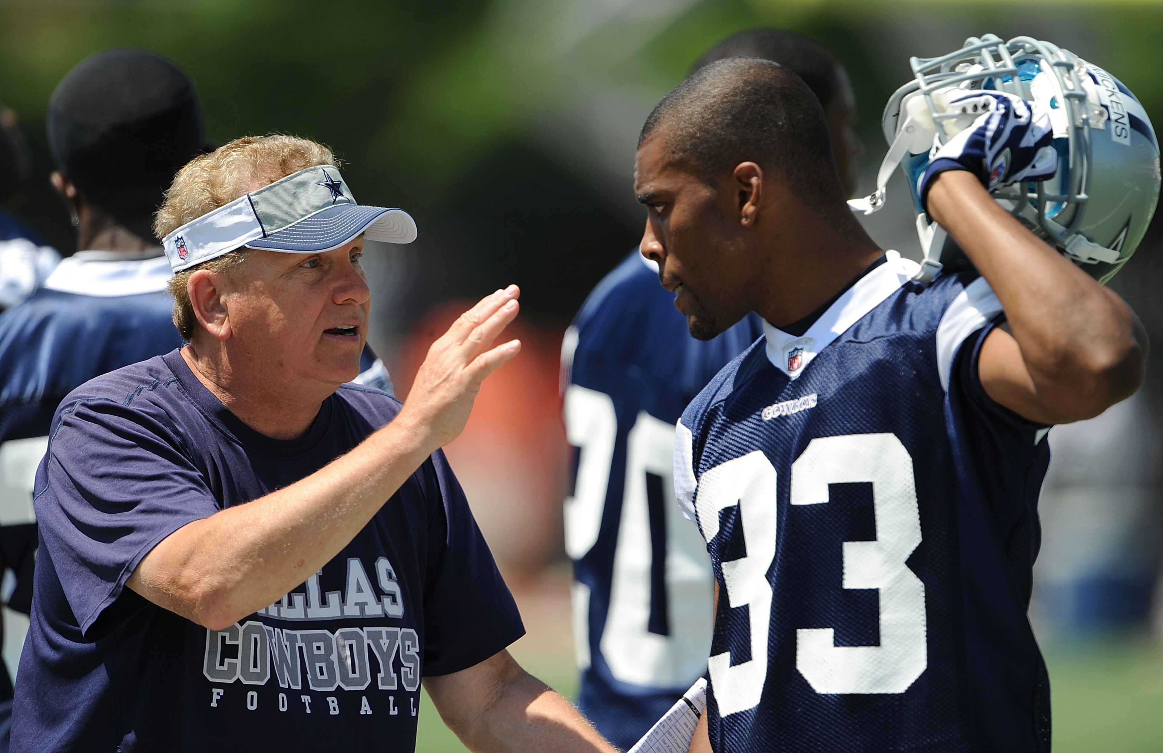 CARROLLTON, TX - JUNE 16:  Secondary coach Dave Campo and Mike Mickens #33 of the Dallas Cowboys during mini camp at Standridge Stadium on June 16, 2009 in Carrollton, Texas.  (Photo by Ronald Martinez/Getty Images)