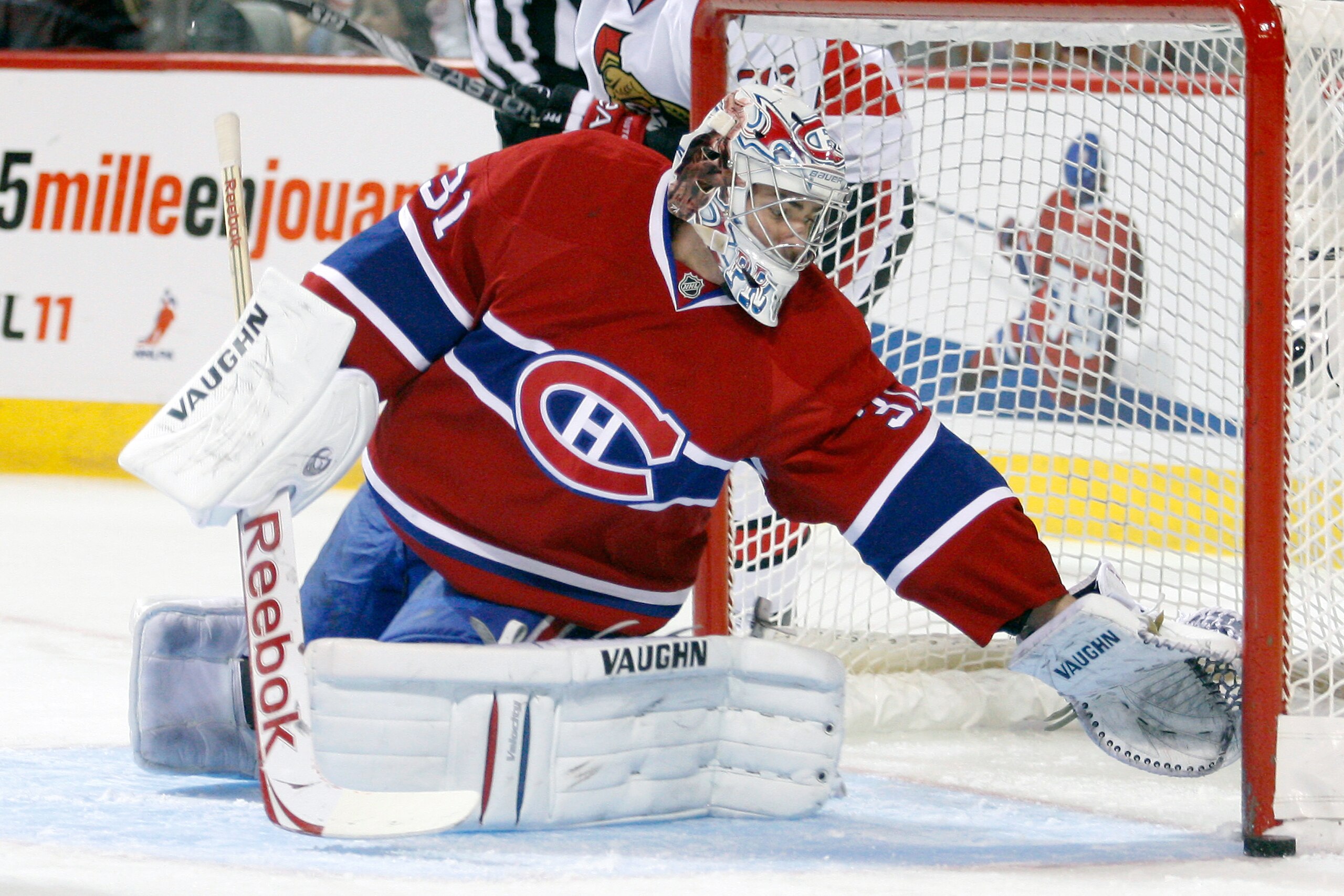 MONTREAL- NOVEMBER 6: Carey Price #31 of the Montreal Canadiens reaches to stop the puck that hit the post during the NHL game against the Ottawa Senators at the Bell Centre on November 6, 2010 in Montreal, Quebec, Canada. (Photo by Richard Wolowicz/Get MONTREAL- NOVEMBER 6: Carey Price #31 of the Montreal Canadiens reaches to stop the puck that hit the post during the NHL game against the Ottawa Senators at the Bell Centre on November 6, 2010 in Montreal, Quebec, Canada. (Photo by Richard Wolowicz/Get