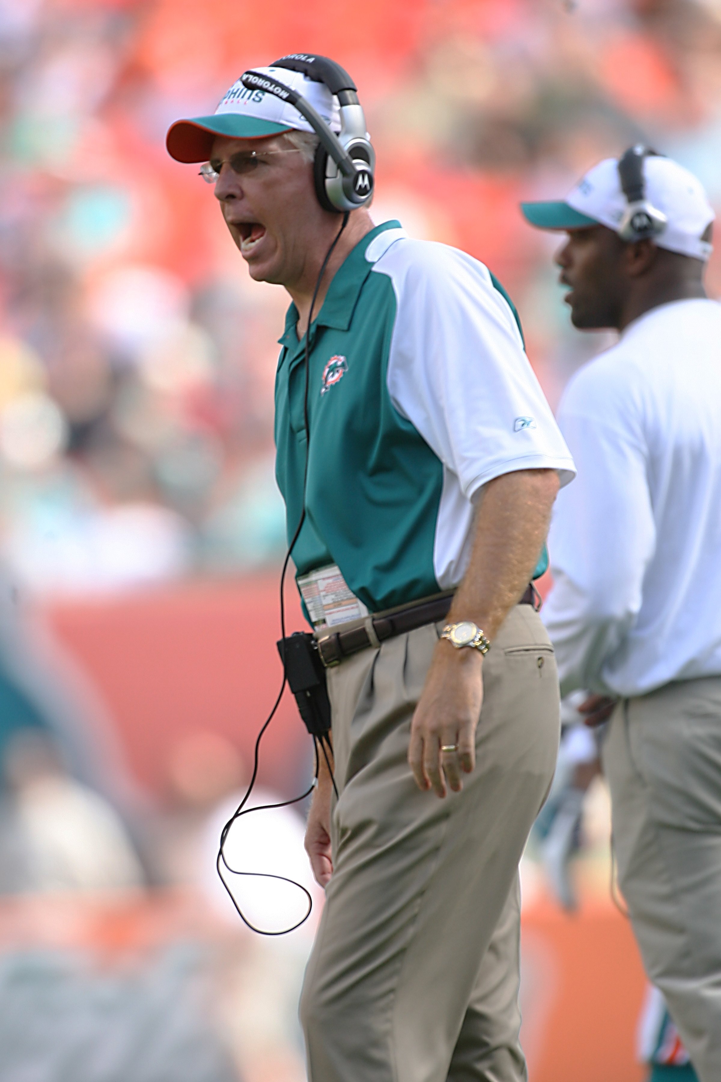 MIAMI - DECEMBER 2:  Head coach Cam Cameron of the Miami Dolphins yells from the sidelines during the NFL game against the New York Jets at the Dolphin Stadium on December 2, 2007 in Miami, Florida. (Photo by Doug Benc/Getty Images)