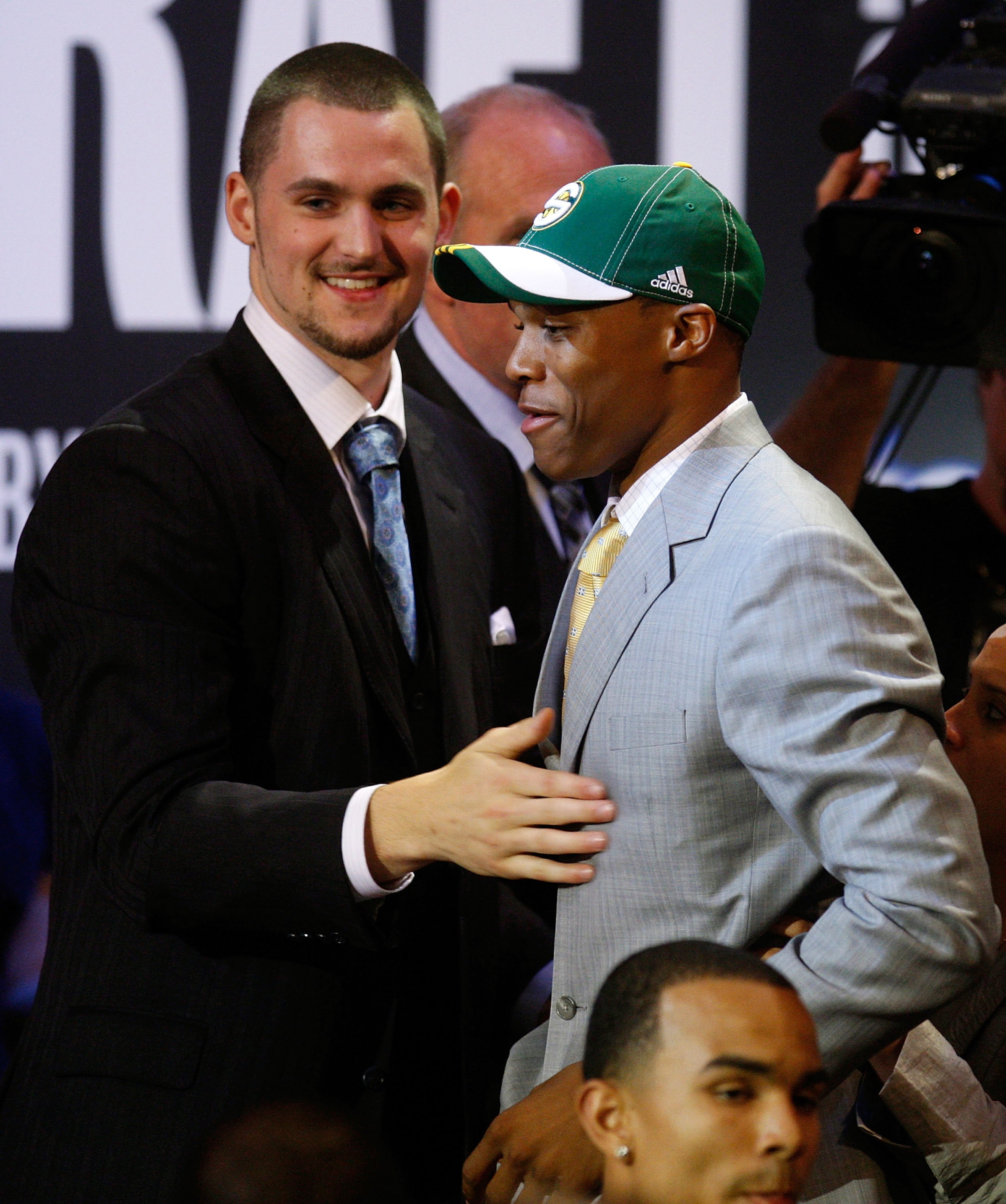 NEW YORK - JUNE 26:  (R-L) Number four draft pick for the Seattle SuperSonics, Russell Westbrook is congratulated by the fifth pick for the Memphis Grizzlies, Kevin Love during the 2008 NBA Draft at the Wamu Theatre at Madison Square Garden June 26, 2008