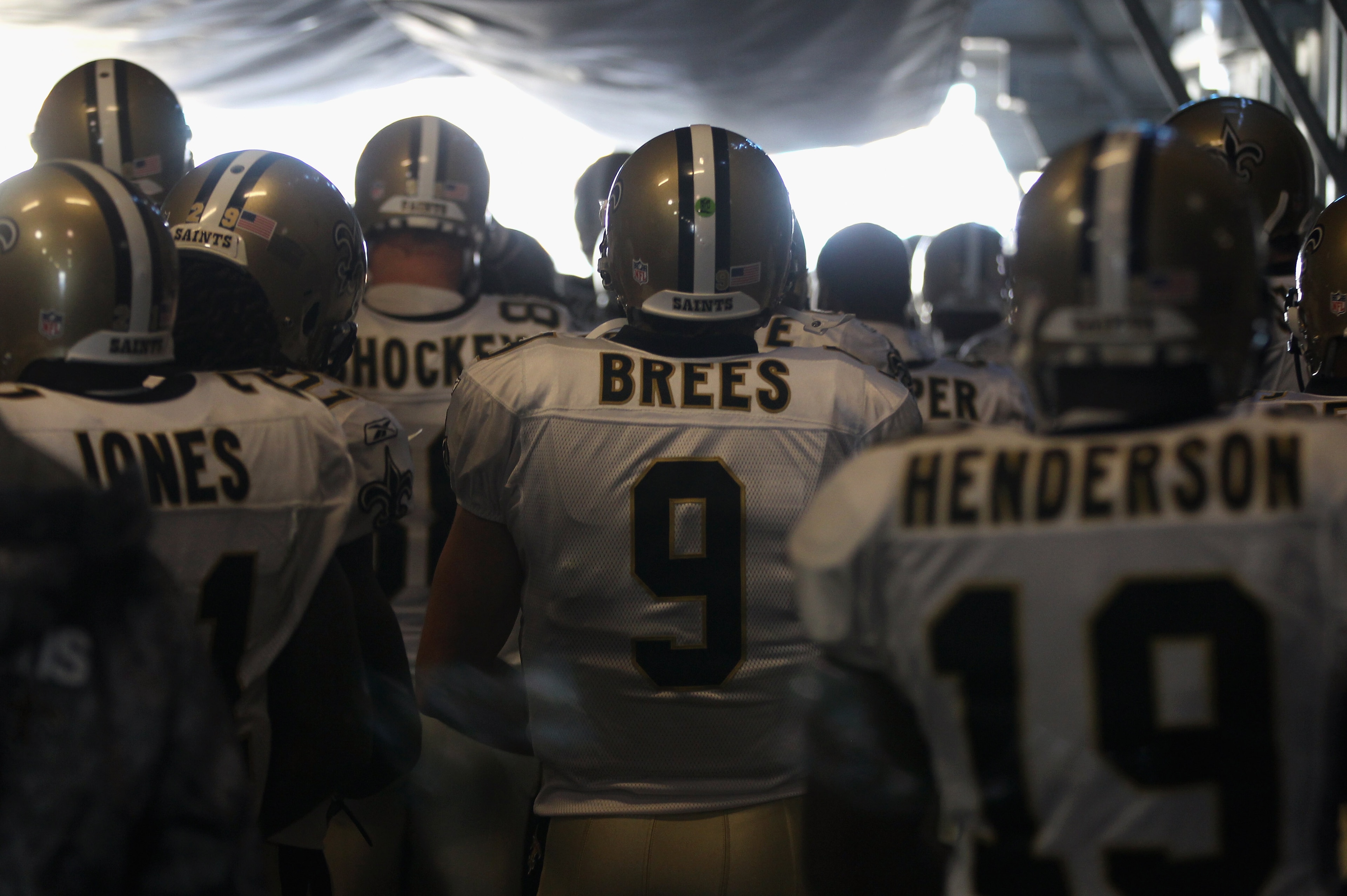 CHARLOTTE, NC - NOVEMBER 07:  Drew Brees #9 of the New Orleans Saints waits with his team during player introductions against the Carolina Panthers at Bank of America Stadium on November 7, 2010 in Charlotte, North Carolina.  (Photo by Streeter Lecka/Gett