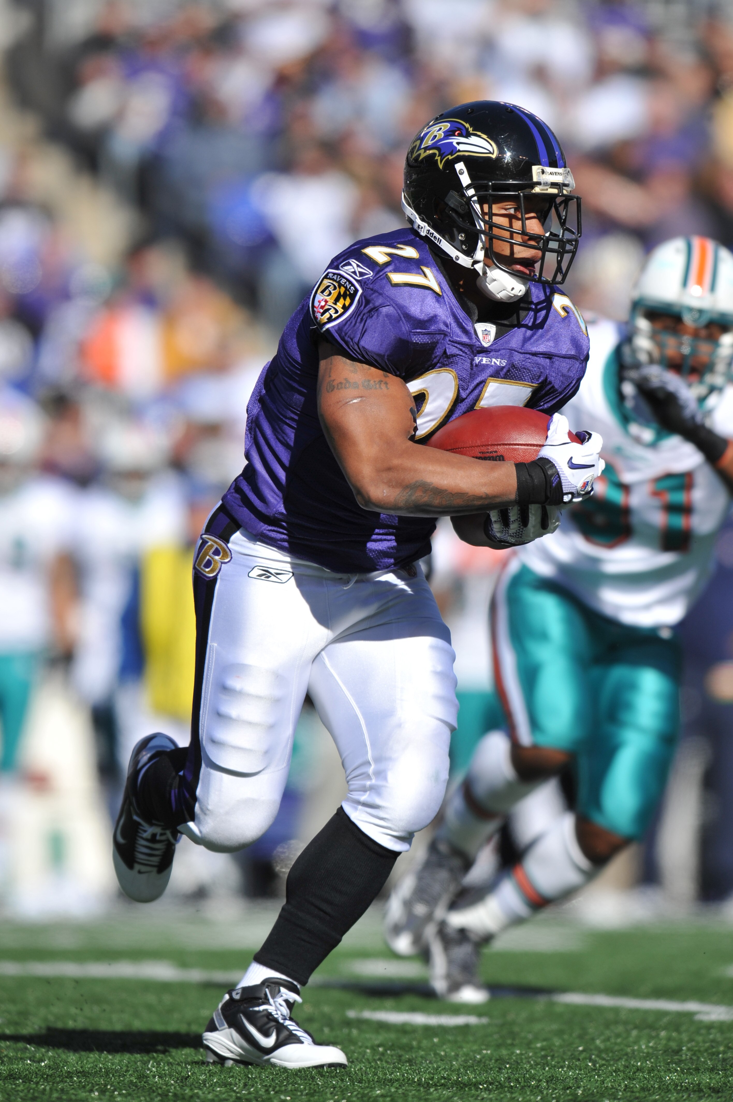 BALTIMORE, MD - NOVEMBER 7:  Ray Rice #27 of the Baltimore Ravens runs the ball against the Miami Dolphins at M&T Bank Stadium on November 7, 2010 in Baltimore, Maryland. The Ravens defeated the Dolphins 26-10. (Photo by Larry French/Getty Images)