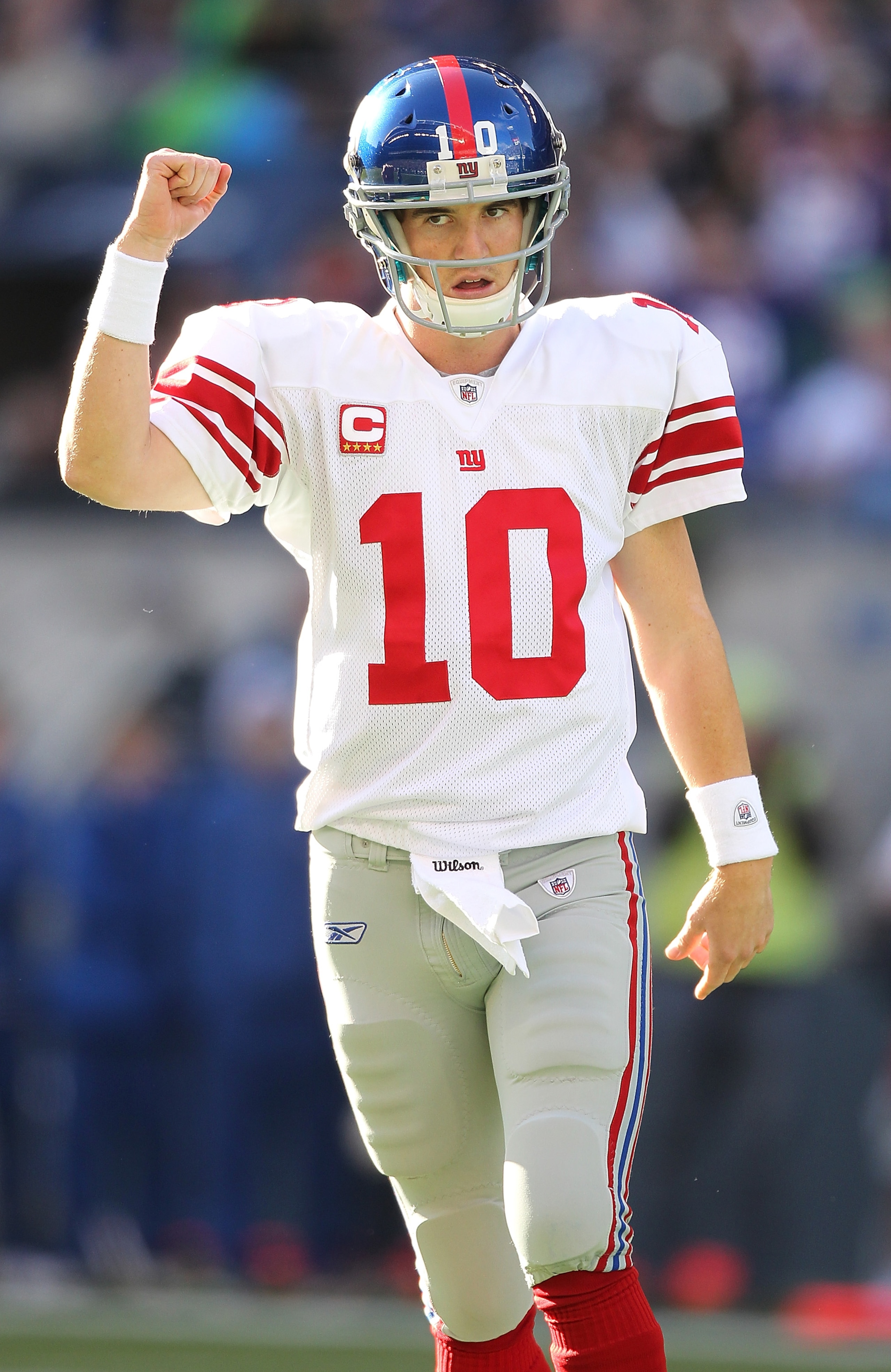 SEATTLE - NOVEMBER 07: Quarterback Eli Manning #10 of the New York Giants celebrates after the Giants scored a touchdown against the Seattle Seahawks at Qwest Field on November 7, 2010 in Seattle, Washington. The Giants defeated the Seahawks 41-7. (Photo SEATTLE - NOVEMBER 07: Quarterback Eli Manning #10 of the New York Giants celebrates after the Giants scored a touchdown against the Seattle Seahawks at Qwest Field on November 7, 2010 in Seattle, Washington. The Giants defeated the Seahawks 41-7. (Photo