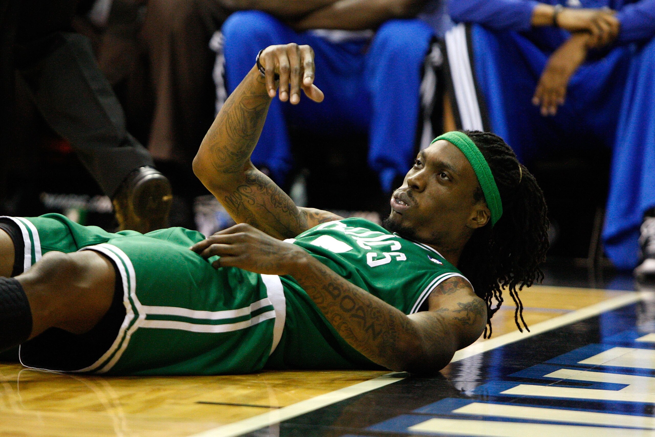ORLANDO, FL - MAY 26: Marquis Daniels of the Boston Celtics looks on as he lies on the court after he suffered a concussion in the second half against the Orlando Magic in Game Five of the Eastern Conference Finals during the 2010 NBA Playoffs at Amway A ORLANDO, FL - MAY 26: Marquis Daniels of the Boston Celtics looks on as he lies on the court after he suffered a concussion in the second half against the Orlando Magic in Game Five of the Eastern Conference Finals during the 2010 NBA Playoffs at Amway A