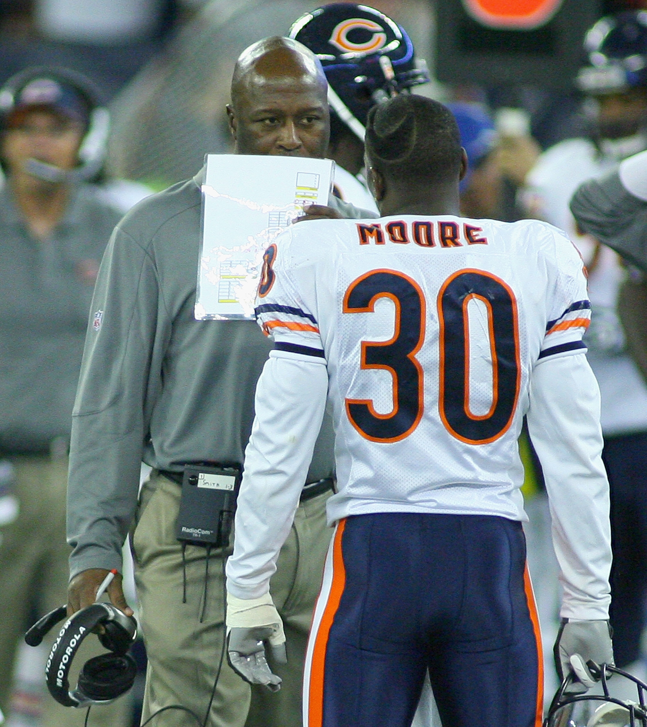 TORONTO, ON - NOVEMBER 07: Lovie Smith, head coach of the Chicago Bears, talks with D.J. Moore #30 , during a timeout against  the Buffalo Bills  at Rogers Centre on November 7, 2010 in Toronto, Canada. Chicago won 22-19. (Photo by Rick Stewart/Getty Imag