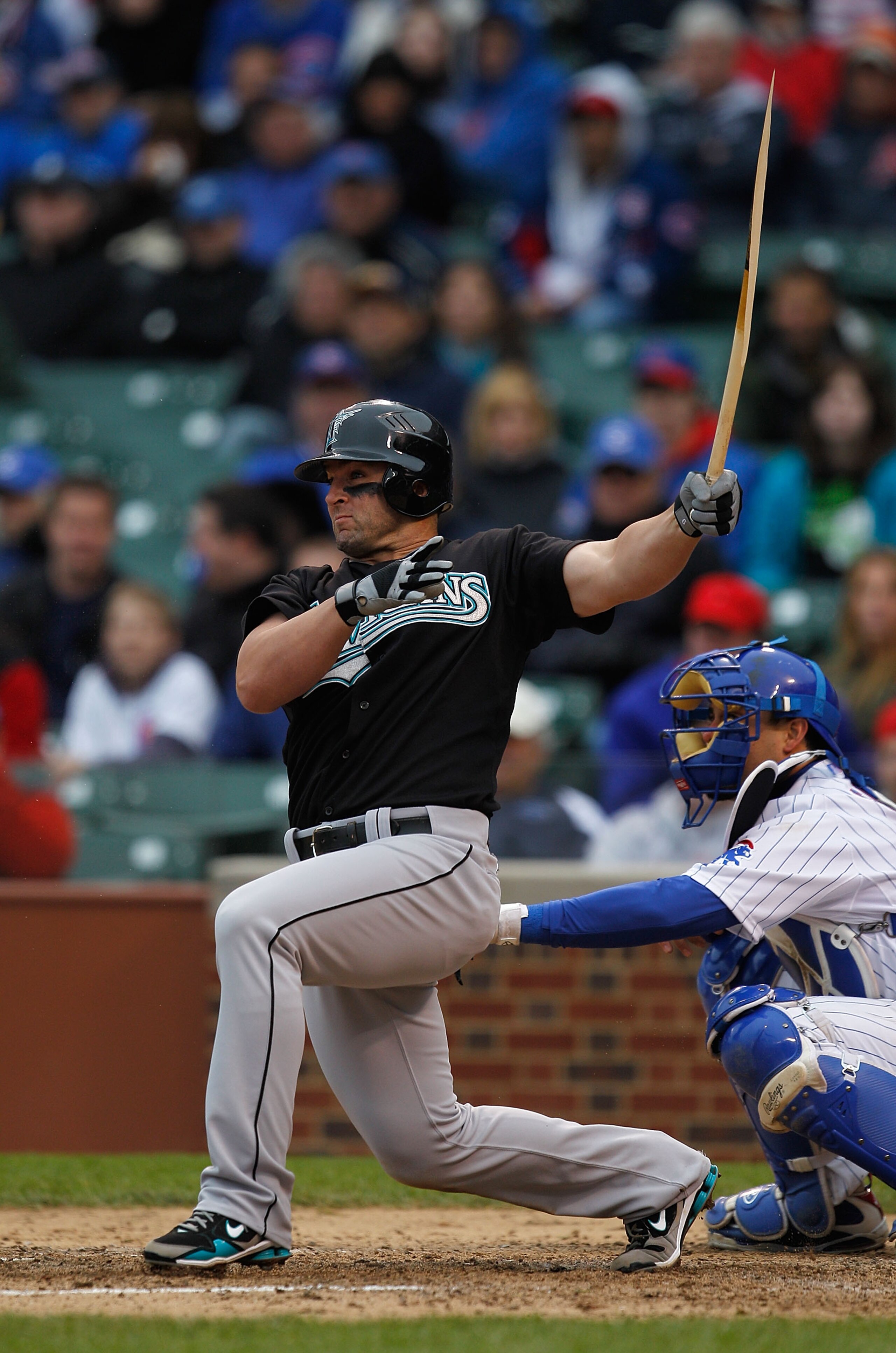 CHICAGO - MAY 12: Dan Uggla #6 of the Florida Marlins is left with a broken bat after a hit in the 8th inning against the Chicago Cubs at Wrigley Field on May 12, 2010 in Chicago, Illinois. The Cubs defeated the Marlins 4-3. (Photo by Jonathan Daniel/Gett