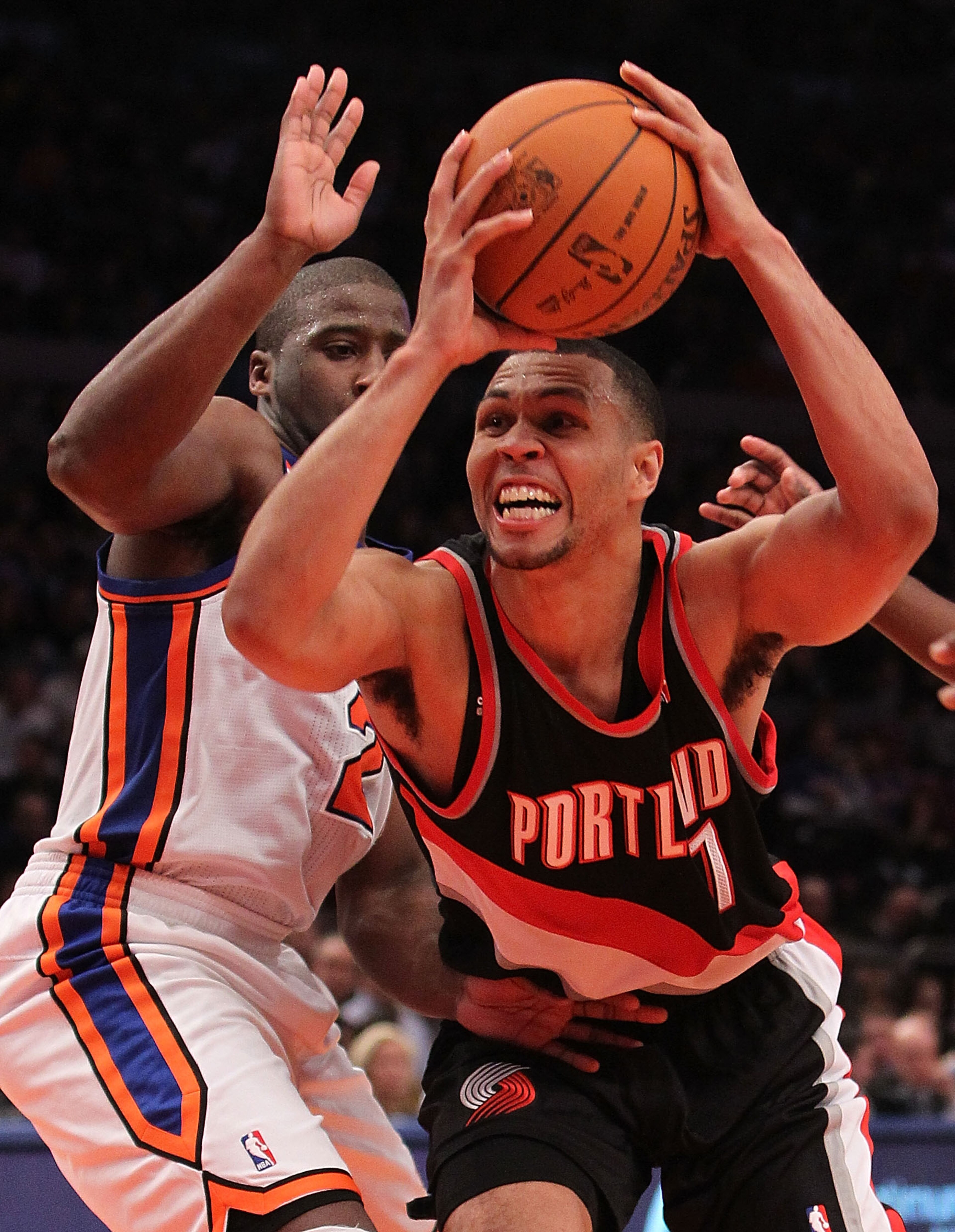 NEW YORK - OCTOBER 30:  Brandon Roy #7 of the Portland Trail Blazer drives past Raymond Felton #2 of the New York Knicks at Madison Square Garden on October 30, 2010 in New York City. NOTE TO USER: User expressly acknowledges and agrees that, by downloadi