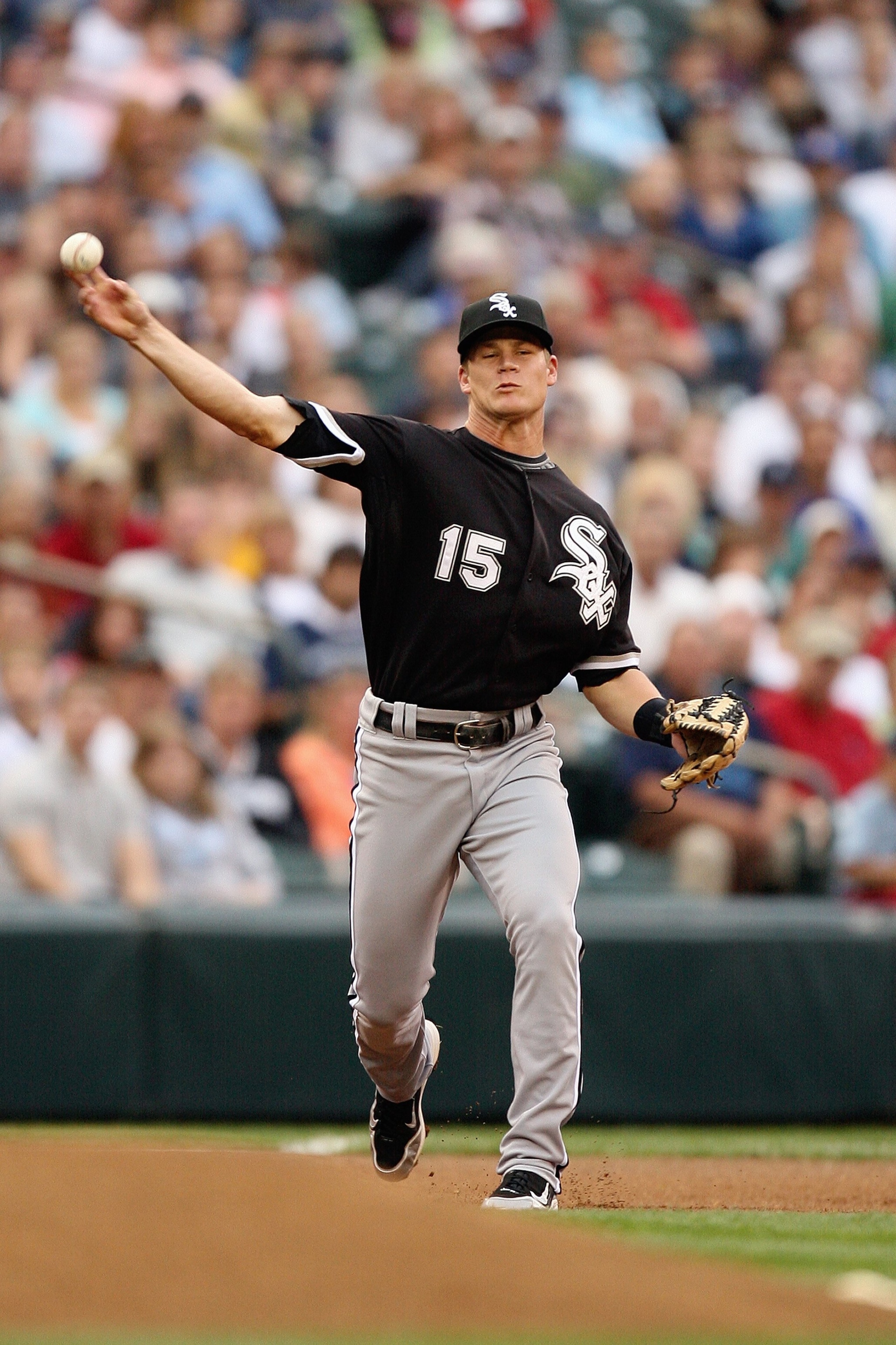 SEATTLE - AUGUST 12:  Gordon Beckham #15 of the Chicago White Sox throws during the game against the Seattle Mariners on August 12, 2009 at Safeco Field in Seattle, Washington. (Photo by Otto Greule Jr/Getty Images)