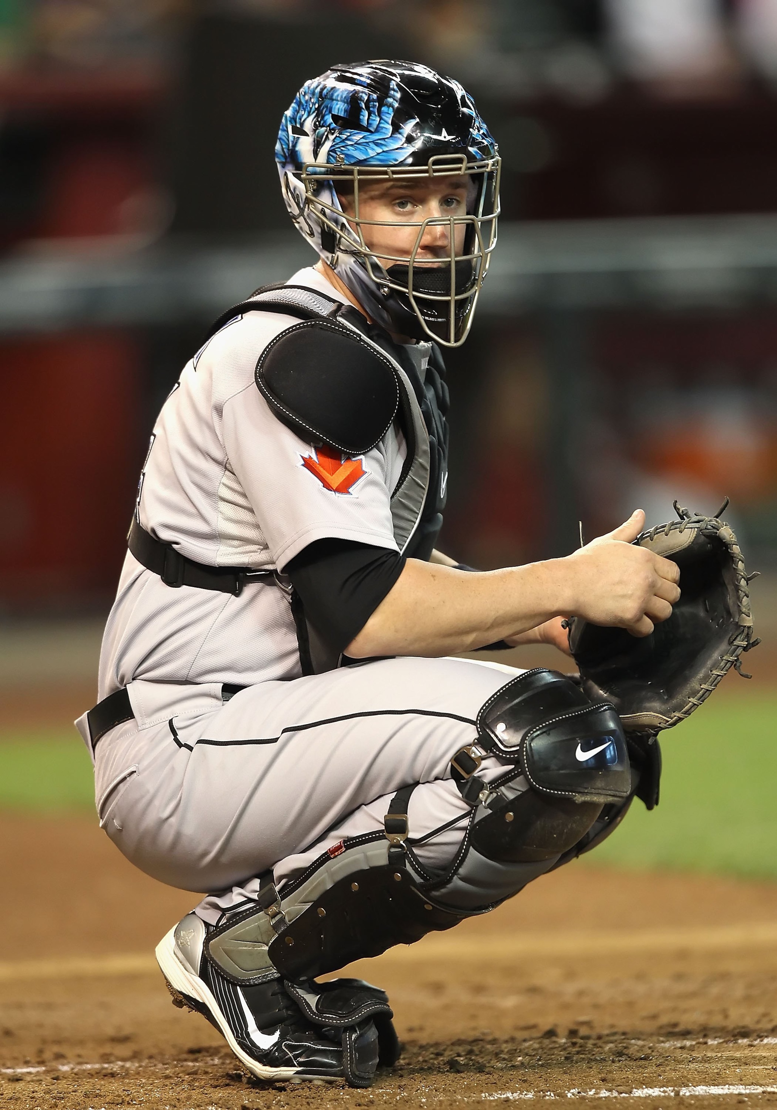 PHOENIX - MAY 22:  Catcher John Buck #14 of the Toronto Blue Jays in action during the Major League Baseball game against the Arizona Diamondbacks at Chase Field on May 22, 2010 in Phoenix, Arizona. The Diamondbacks defeated the Blue Jays 8-5.  (Photo by 