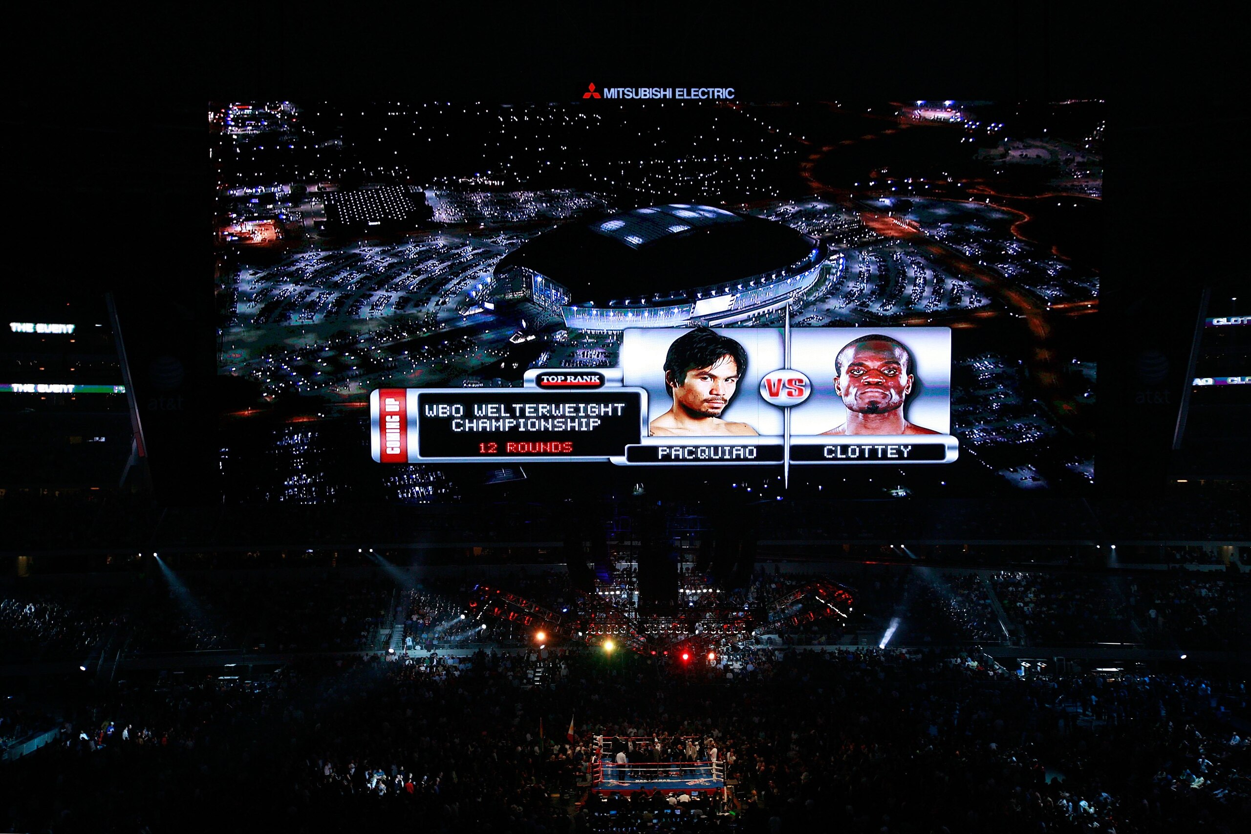 ARLINGTON, TX - MARCH 13: The video screen previews the fight between Manny Pacquiao of the Philippines and Joshua Clottey of Ghana before their WBO welterweight title fight at Cowboys Stadium on March 13, 2010 in Arlington, Texas. (Photo by Tom Penning ARLINGTON, TX - MARCH 13: The video screen previews the fight between Manny Pacquiao of the Philippines and Joshua Clottey of Ghana before their WBO welterweight title fight at Cowboys Stadium on March 13, 2010 in Arlington, Texas. (Photo by Tom Penning