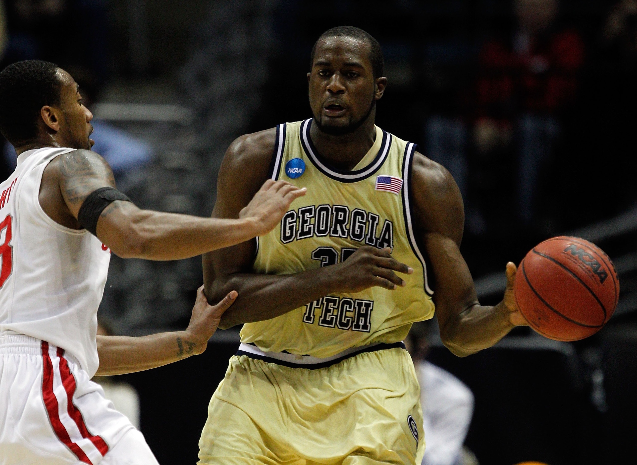 MILWAUKEE - MARCH 21:  Zachery Peacock #35 of the Georgia Tech Yellow Jackets passes the ball as he is covered by David Lighty #23 of the Ohio State Buckeyes during the second round of the 2010 NCAA men's basketball tournament at the Bradley Center on Mar