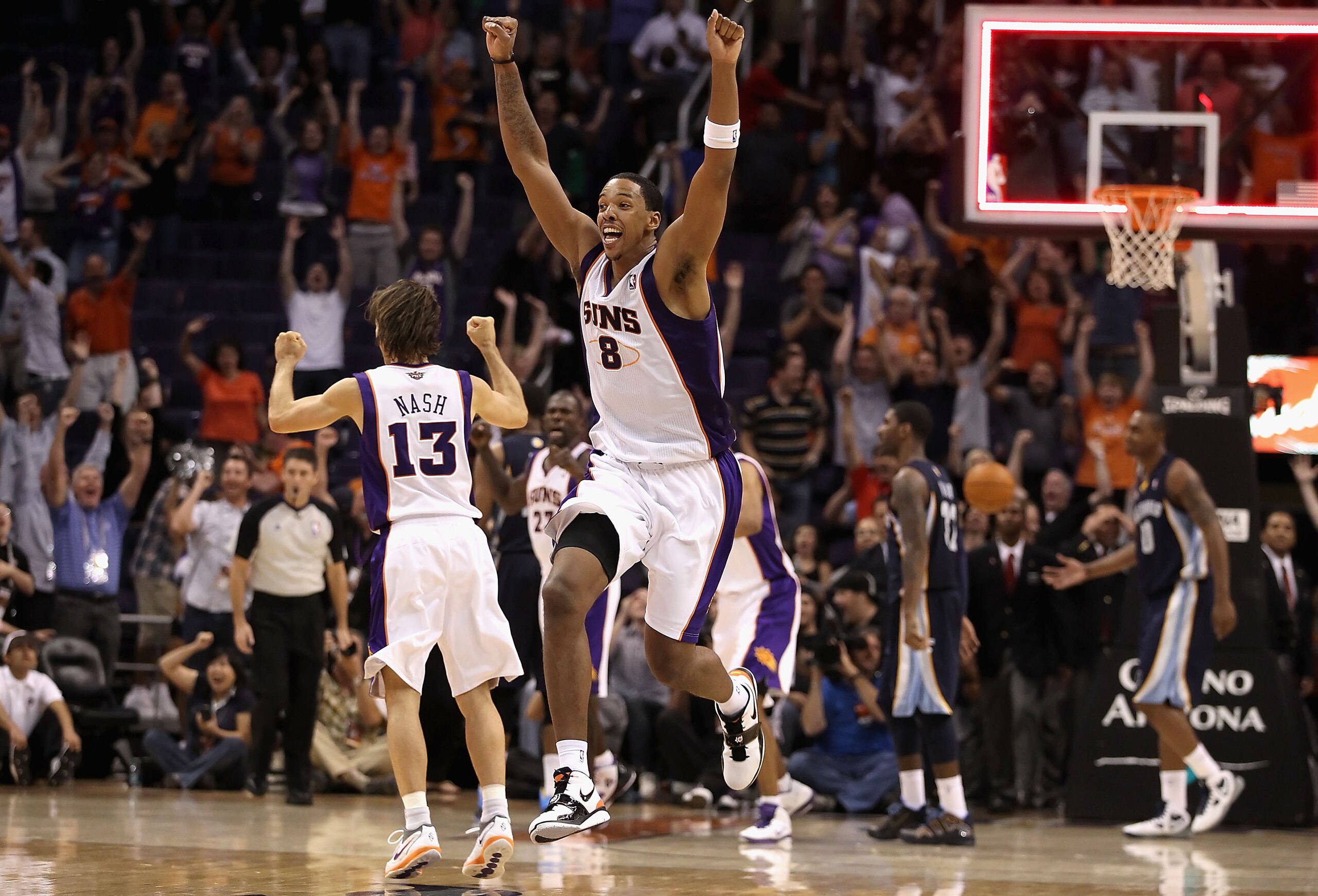 PHOENIX - NOVEMBER 05:  Channing Frye #8 of the Phoenix Suns celebrates after Jason Richardson (not pictured) tied the game in the final seconds to force overtime against the Memphis Grizzlies during the NBA game at US Airways Center on November 5, 2010 i