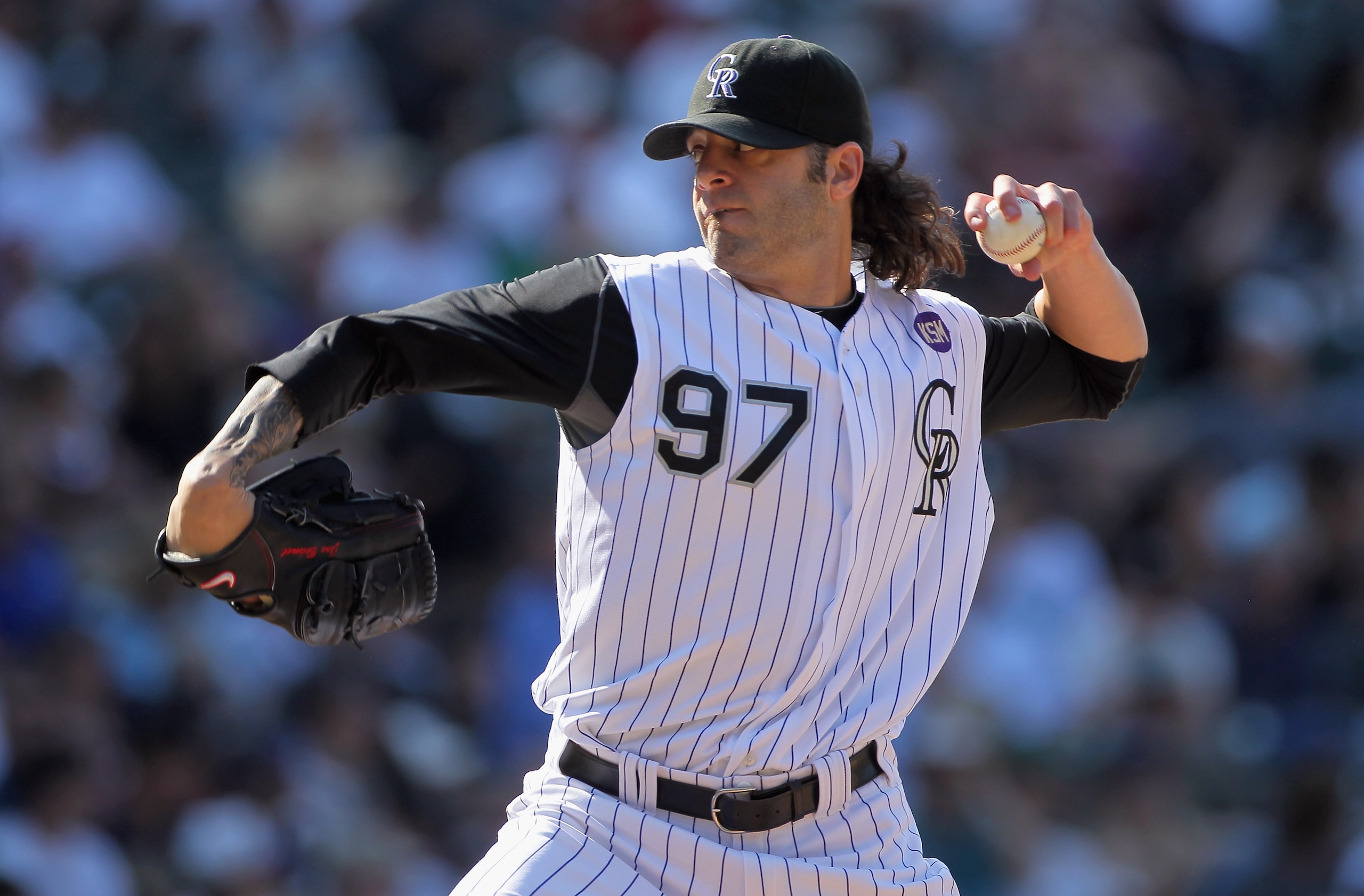 DENVER - SEPTEMBER 15:  Relief pitcher Joe Beimel #97 of the Colorado Rockies delivers against the San Diego Padres at Coors Field on September 15, 2010 in Denver, Colorado. The Rockies defeated the Padres 9-6.  (Photo by Doug Pensinger/Getty Images)