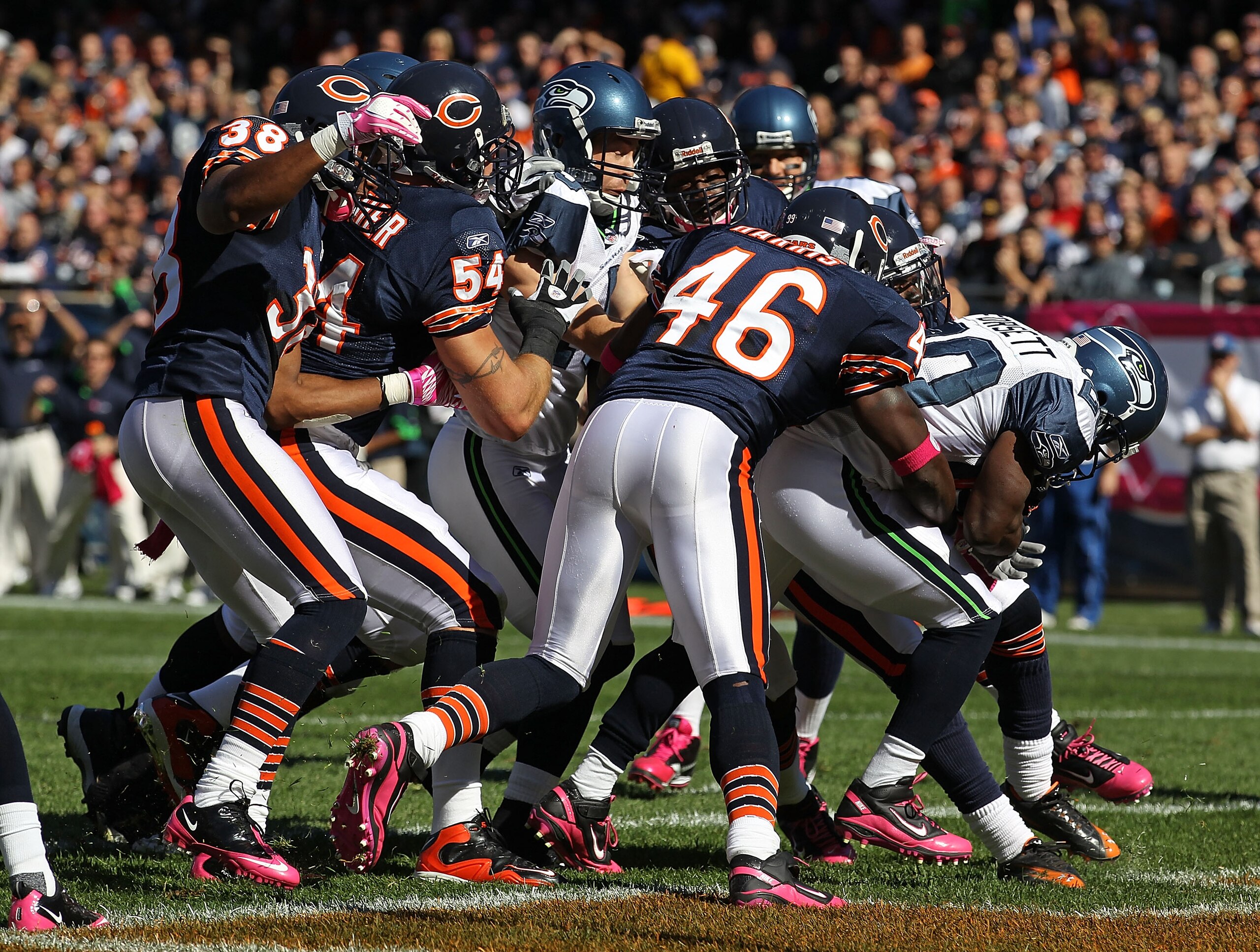 CHICAGO - OCTOBER 17: Justin Forsett #20 of the Seattle Seahawks scores a touchdown pursues by Chris Harris #46, Brian Urlacher #54 and Danieal Manning #38 of the Chicago Bears at Soldier Field on October 17, 2010 in Chicago, Illinois. The Seahawks defeat CHICAGO - OCTOBER 17: Justin Forsett #20 of the Seattle Seahawks scores a touchdown pursues by Chris Harris #46, Brian Urlacher #54 and Danieal Manning #38 of the Chicago Bears at Soldier Field on October 17, 2010 in Chicago, Illinois. The Seahawks defeat