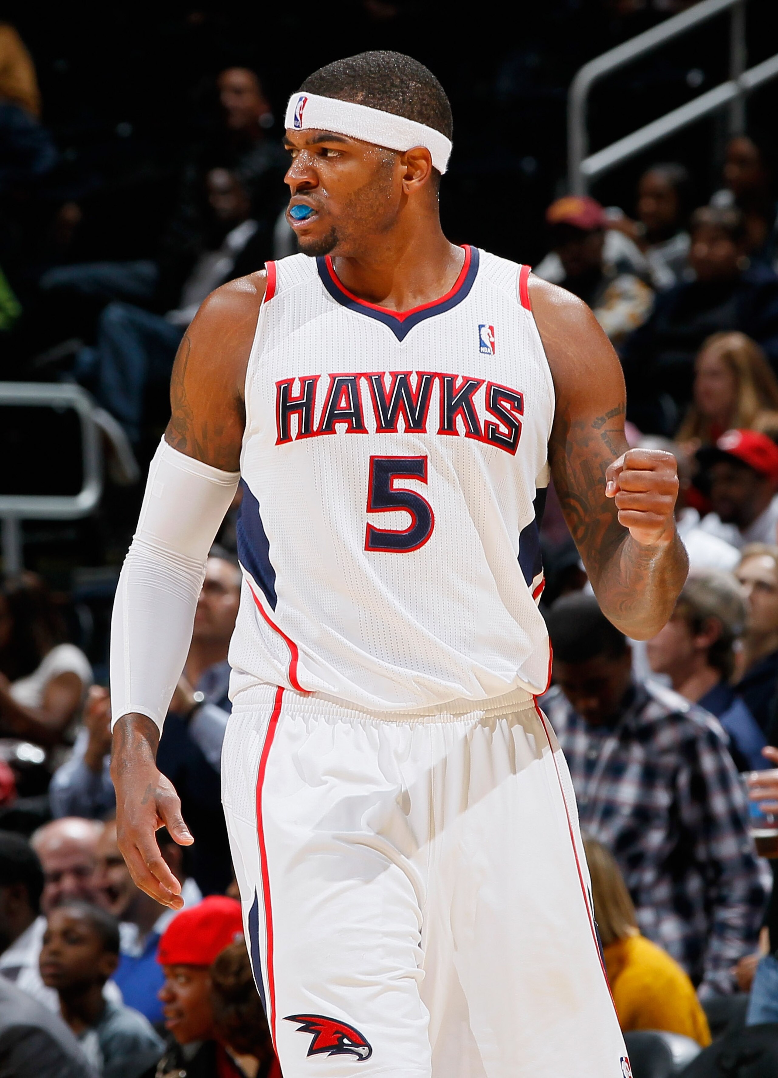 ATLANTA - NOVEMBER 03:  Josh Smith #5 of the Atlanta Hawks reacts after a basket against the Detroit Pistons at Philips Arena on November 3, 2010 in Atlanta, Georgia.  NOTE TO USER: User expressly acknowledges and agrees that, by downloading and/or using