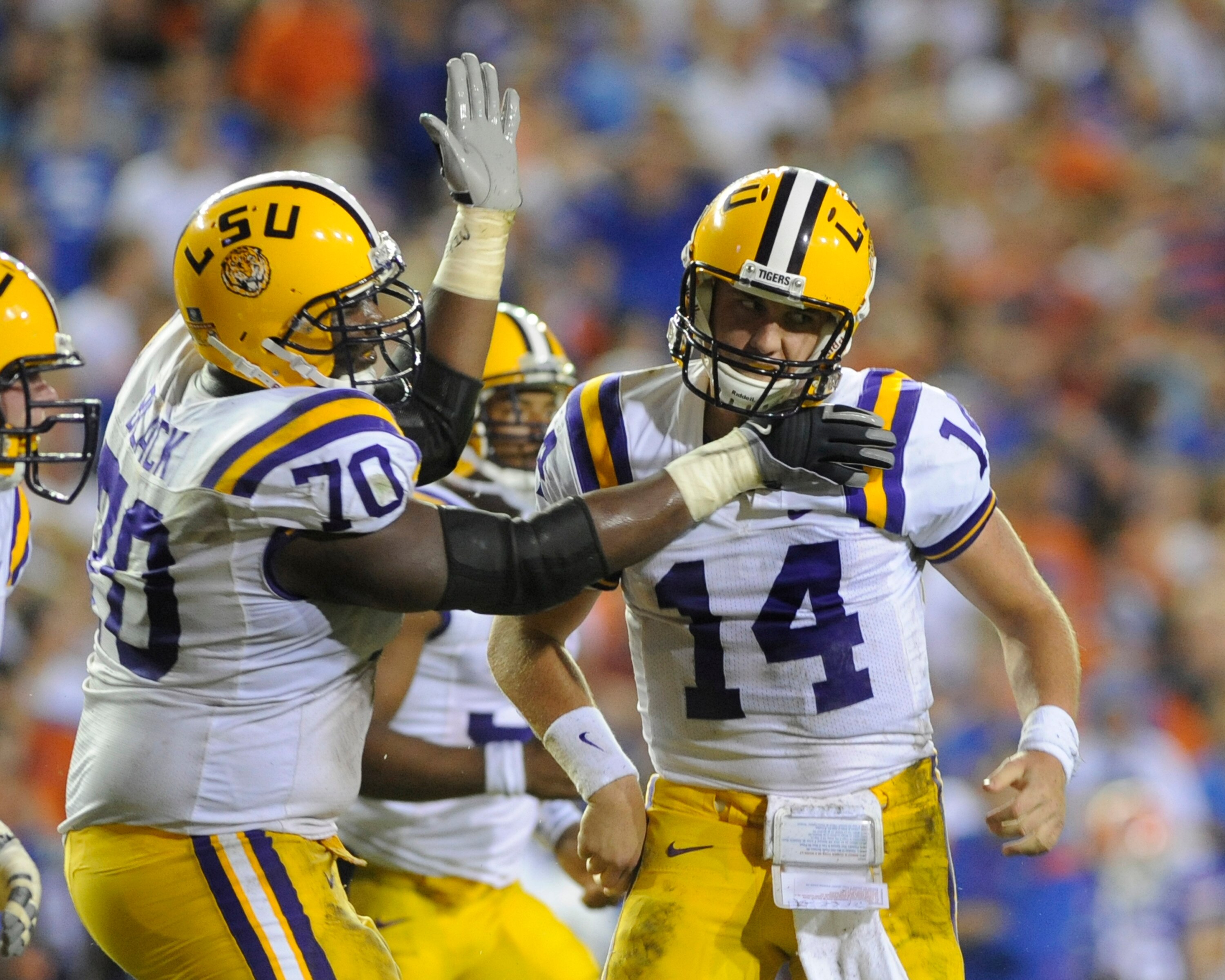 GAINESVILLE, FL - OCTOBER 11: Quarterback Andrew Hatch #14 of the LSU Tigers celebrates a touchdown against the University of Florida Gators at Ben Hill Griffin Stadium on October 11, 2008 in Gainesville, Florida.  (Photo by Al Messerschmidt/Getty Images)