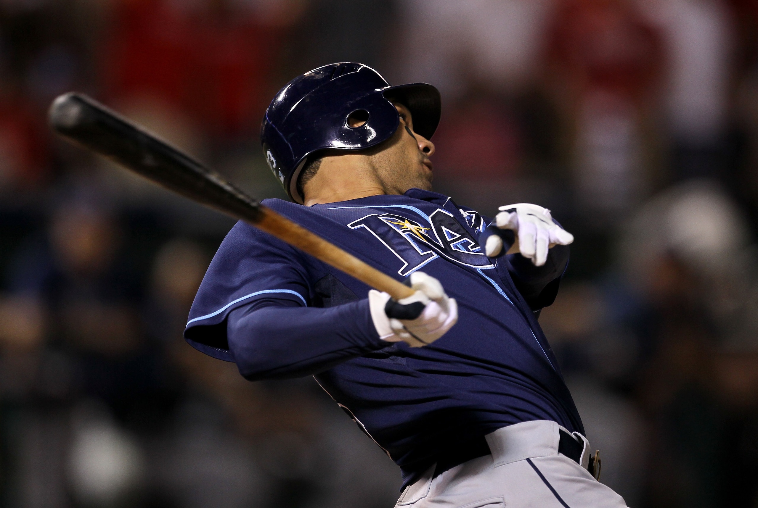 ARLINGTON, TX - OCTOBER 9:  Carlos Pena #23 of the Tampa Bay Rays hits a two run home run in the ninth inning against the Texas Rangers during game three of the ALDS at Rangers Ballpark in Arlington on October 9, 2010 in Arlington, Texas.  The Rays won 6-