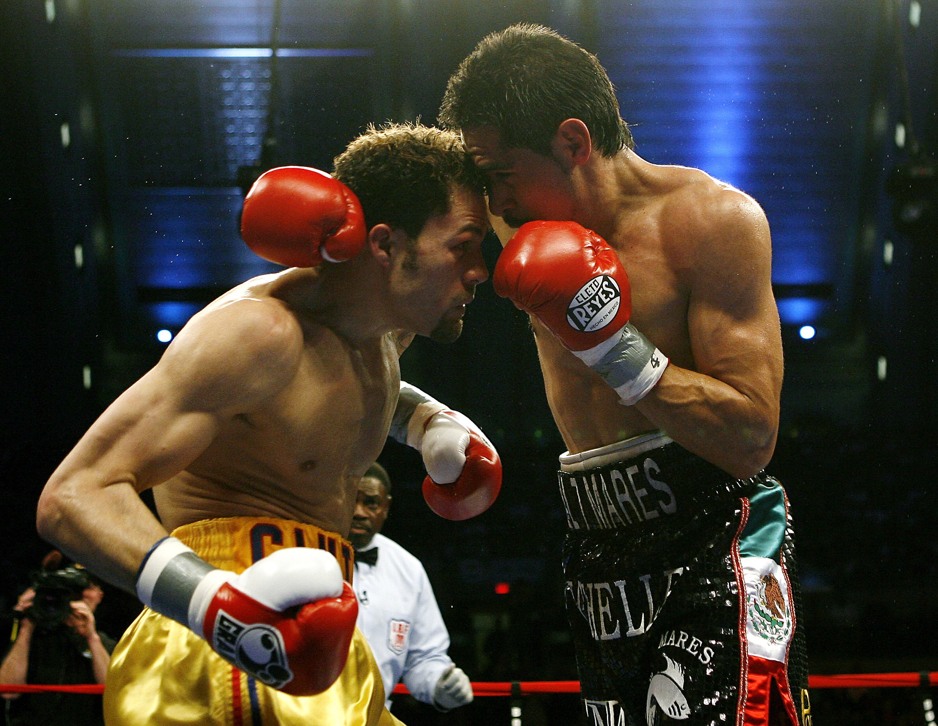 ATLANTIC CITY, NJ  - APRIL 12: Antonio Margarito (R) throws a punch during his IBF World Welterweight Title bout against Kermit Cintron at Boardwalk Hall on April 12, 2008 in Atlantic City, New Jersey. (Photo by Jeff Zelevansky/Getty Images)