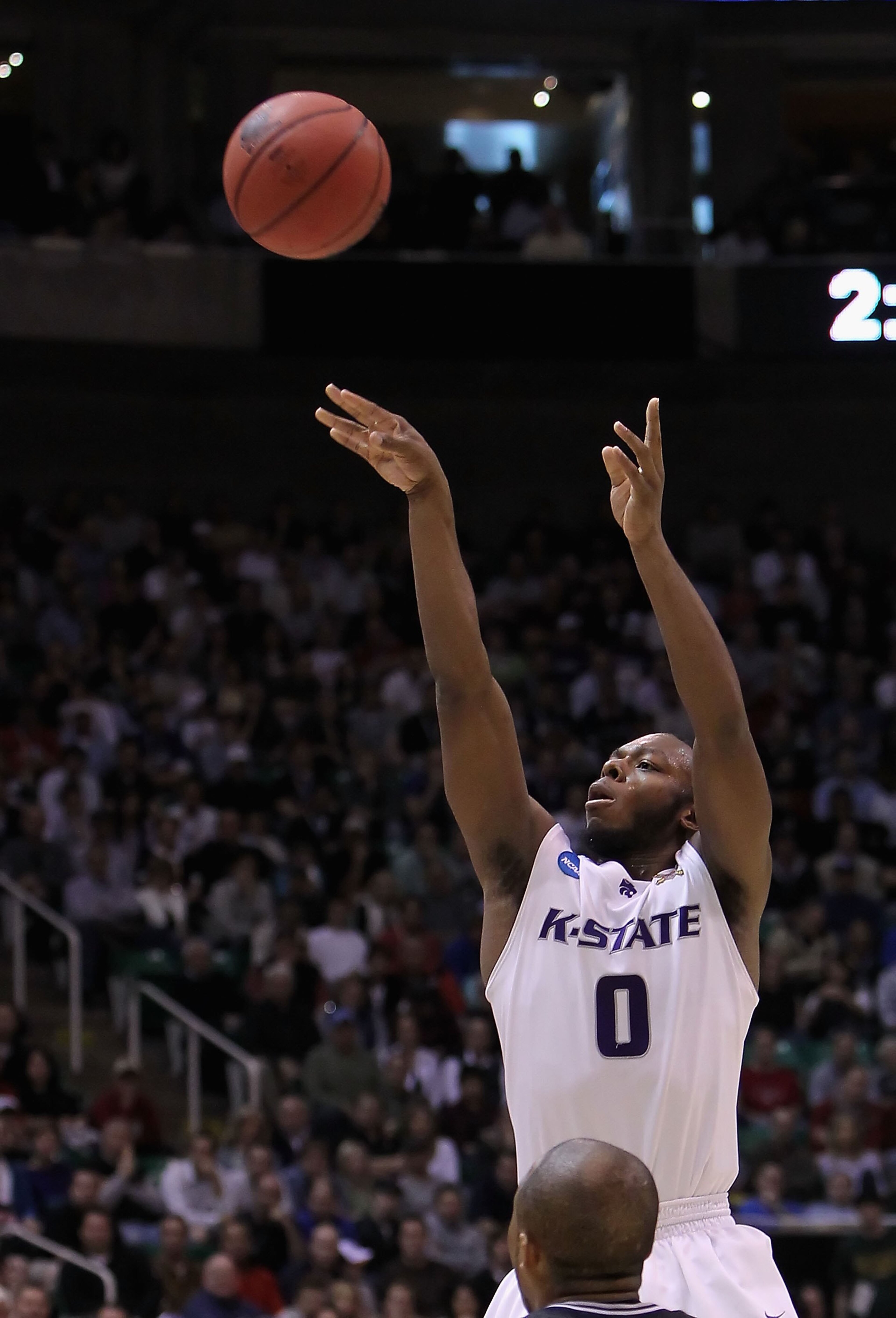 SALT LAKE CITY - MARCH 27:  Jacob Pullen #0 of the Kansas State Wildcats puts up a shot against the Butler Bulldogs during the west regional final of the 2010 NCAA men's basketball tournament at the Energy Solutions Arena on March 27, 2010 in Salt Lake Ci