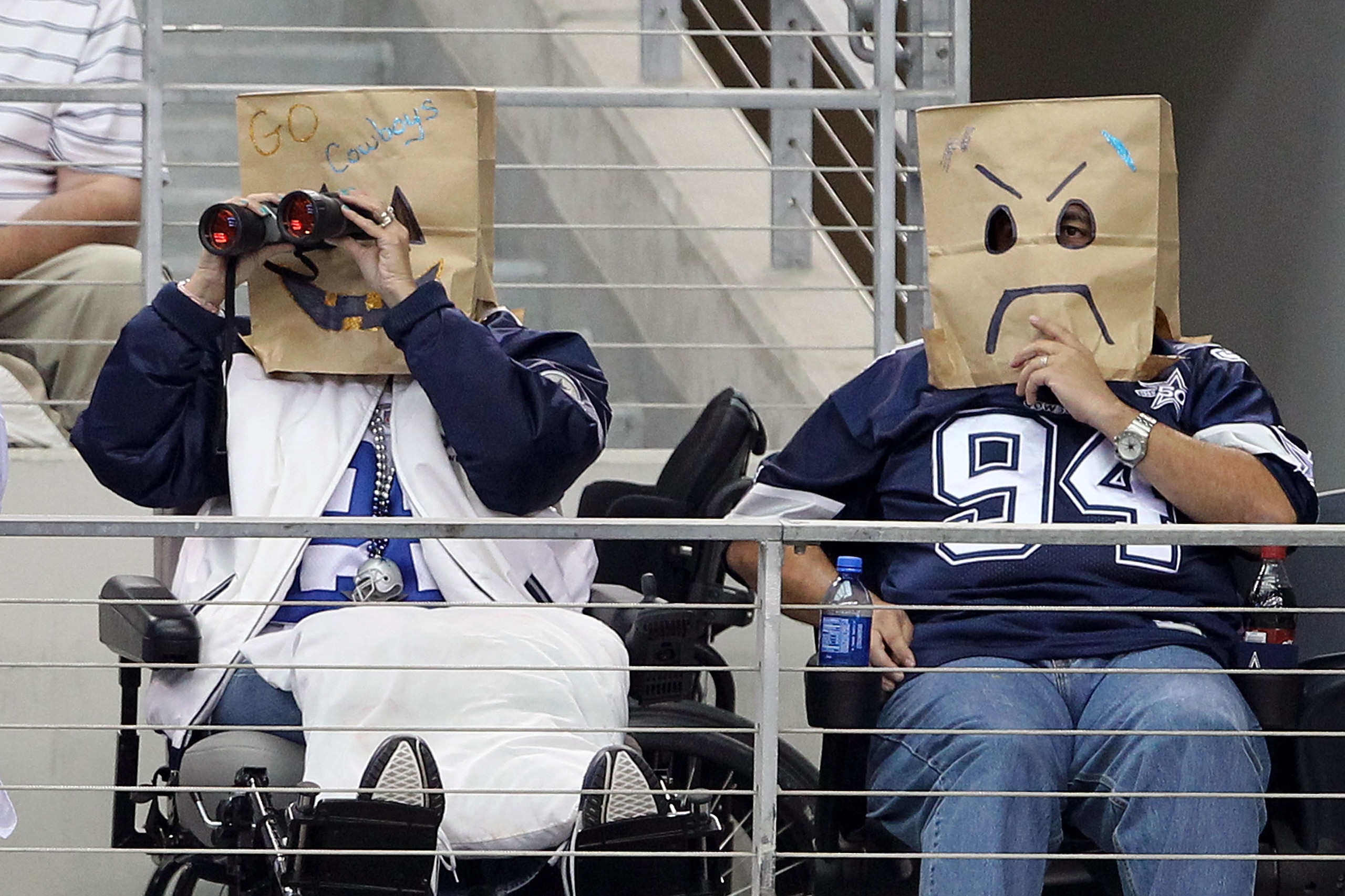 ARLINGTON, TX - OCTOBER 31: Fans of the Dallas Cowboys wear brown paper bags over their head as they watch the Cowboys play against the Jacksonville Jaguars at Cowboys Stadium on October 31, 2010 in Arlington, Texas. (Photo by Chris Chambers/Getty Image ARLINGTON, TX - OCTOBER 31: Fans of the Dallas Cowboys wear brown paper bags over their head as they watch the Cowboys play against the Jacksonville Jaguars at Cowboys Stadium on October 31, 2010 in Arlington, Texas. (Photo by Chris Chambers/Getty Image
