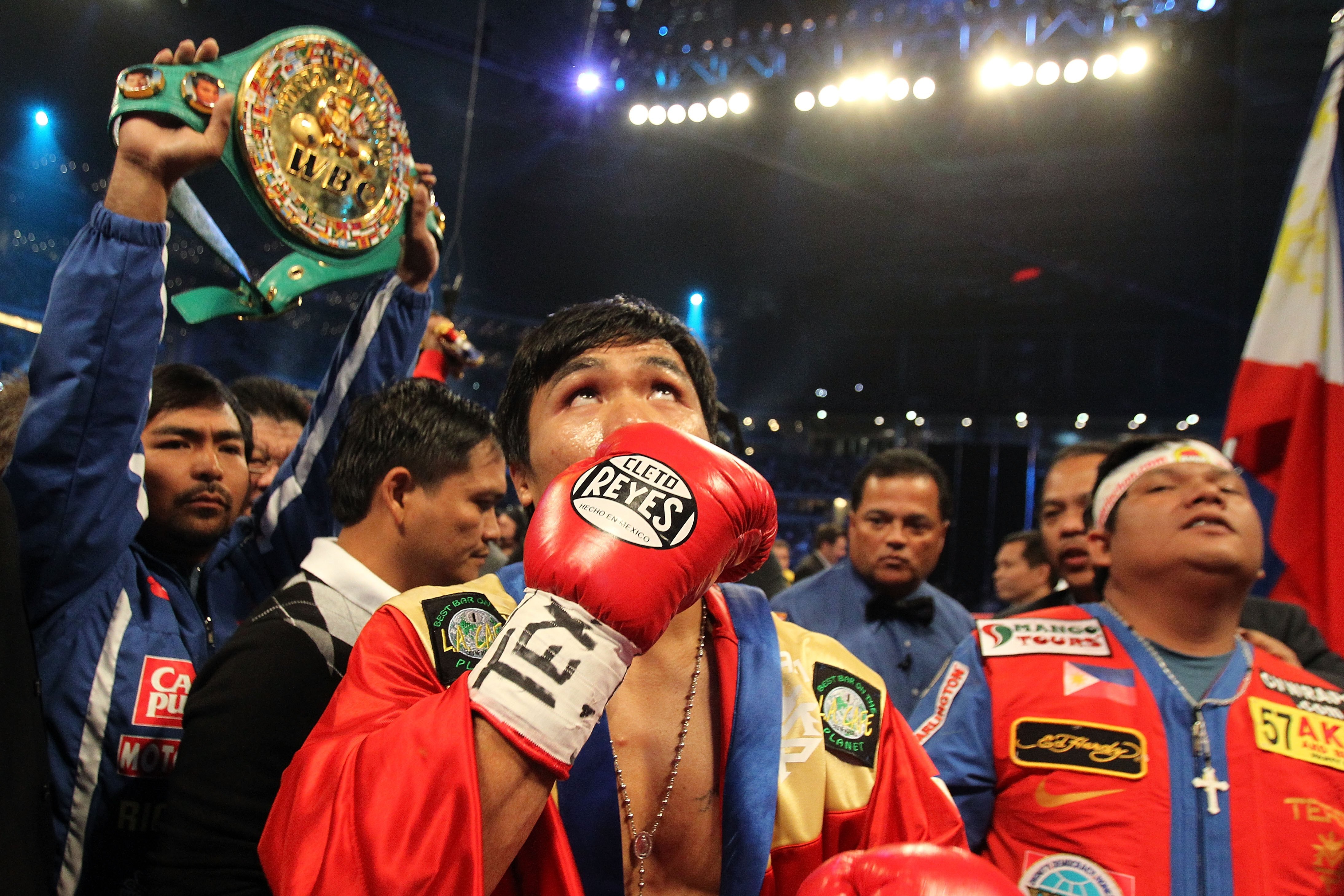 ARLINGTON, TX - MARCH 13:  Manny Pacquiao of the Philippines in the ring before taking on Joshua Clottey of Ghana during the WBO welterweight title fight at Cowboys Stadium on March 13, 2010 in Arlington, Texas.  (Photo by Jed Jacobsohn/Getty Images)
