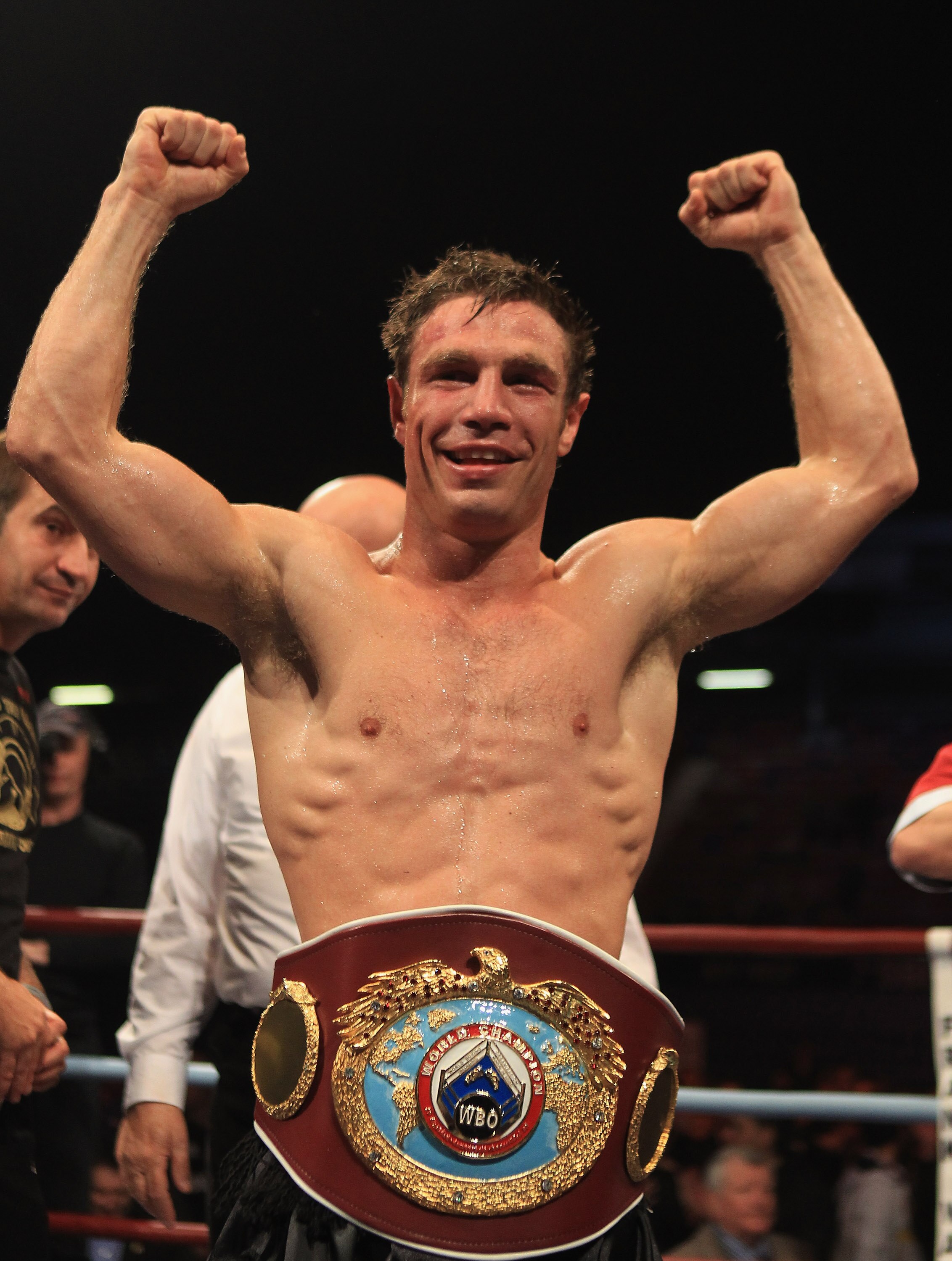 LONDON, ENGLAND - MAY 15:  Michael Katsidis of Australia celebrates beating Kevin Mitchell of England in the third round to retain the WBO Lightweight Championship of the World at Boleyn Ground on May 15, 2010 in London, England.  (Photo by Warren Little/