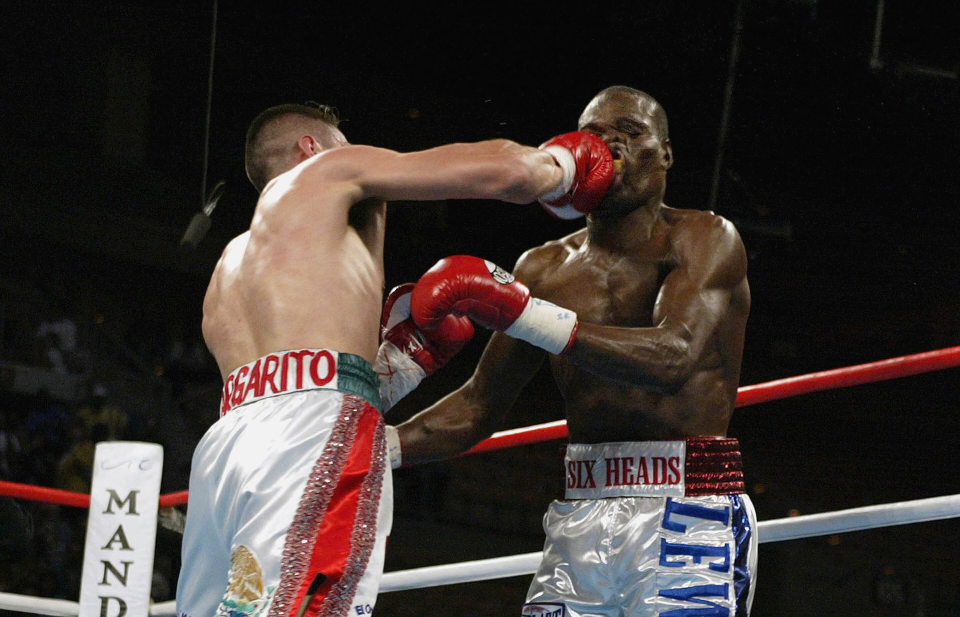 LAS VEGAS, NV - FEBRUARY 8:  Antonio Margarito of Mexico lands a right to the face of Andrew Lewis that ended up in a knockout in the 2nd round during their WBO Welterweight Championship Fight at the Mandalay Bay Resort & Casino on February 8, 2003 in Las