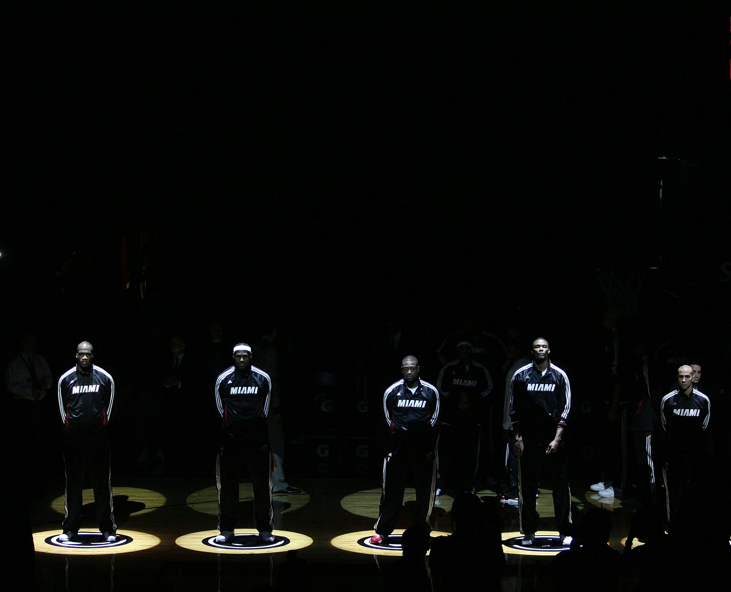 MIAMI - NOVEMBER 06:  (L-R) Joel Anthony #50, LeBron James #6, Dwyane Wade #3, CXhris Bosh #1 and Carlos Arroyo # of the Miami Heat are introduced against the New Jersey Nets  at American Airlines Arena on November 6, 2010 in Miami, Florida. NOTE TO USER: