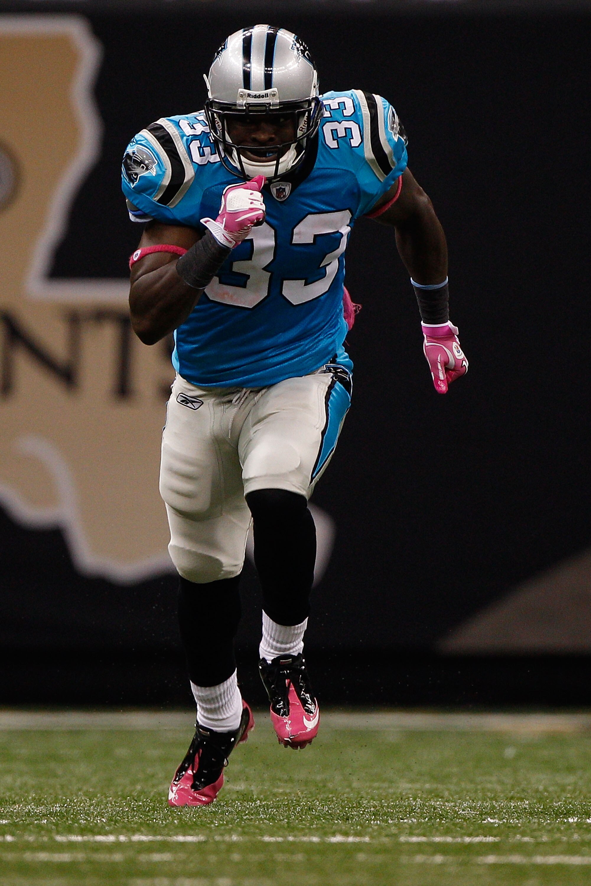 NEW ORLEANS - OCTOBER 03:  Mike Goodson #33  of the Carolina Panthers in action during the game against the New Orleans Saints at the Louisiana Superdome on October 3, 2010 in New Orleans, Louisiana.  (Photo by Chris Graythen/Getty Images)
