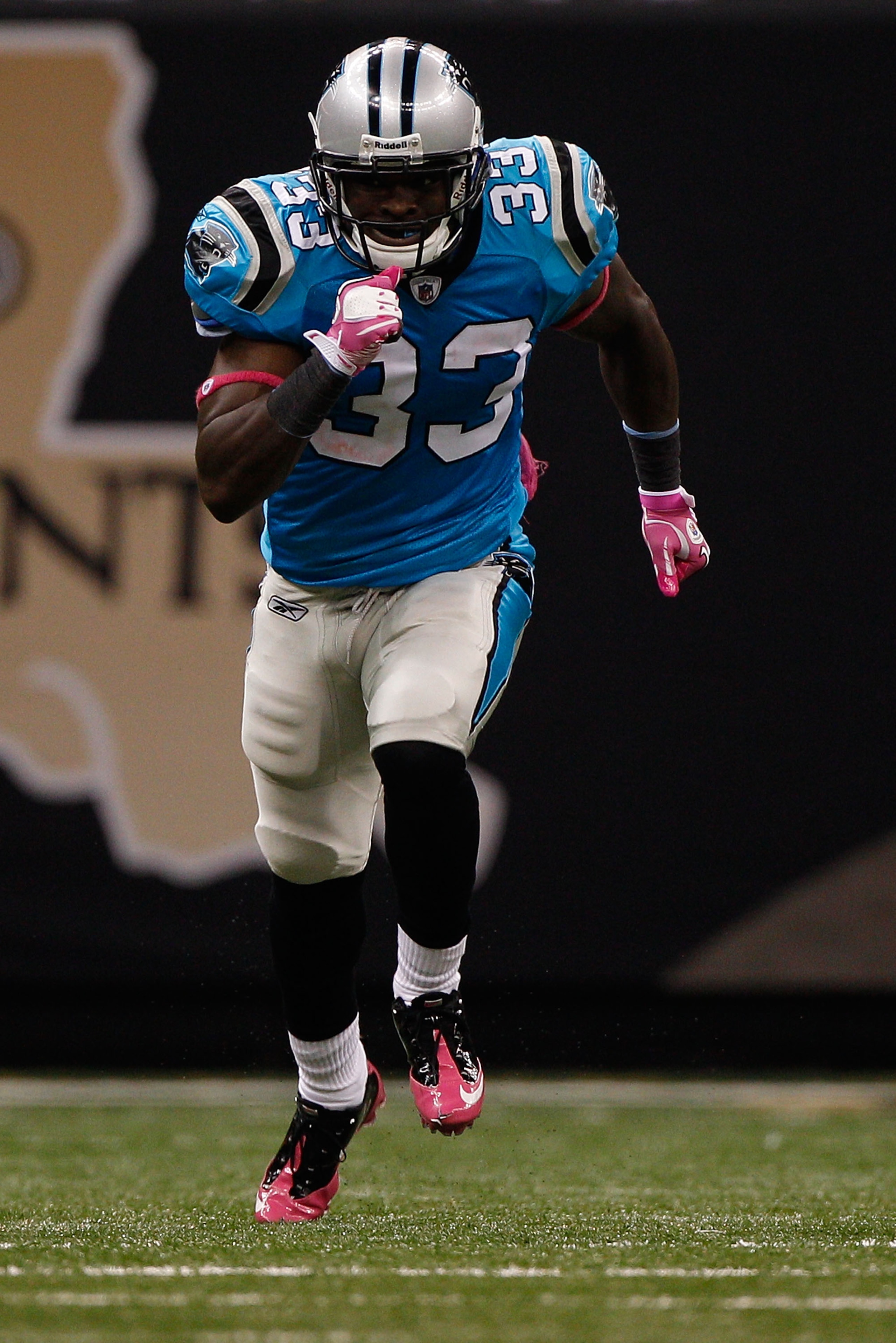 NEW ORLEANS - OCTOBER 03:  Mike Goodson #33  of the Carolina Panthers in action during the game against the New Orleans Saints at the Louisiana Superdome on October 3, 2010 in New Orleans, Louisiana.  (Photo by Chris Graythen/Getty Images)