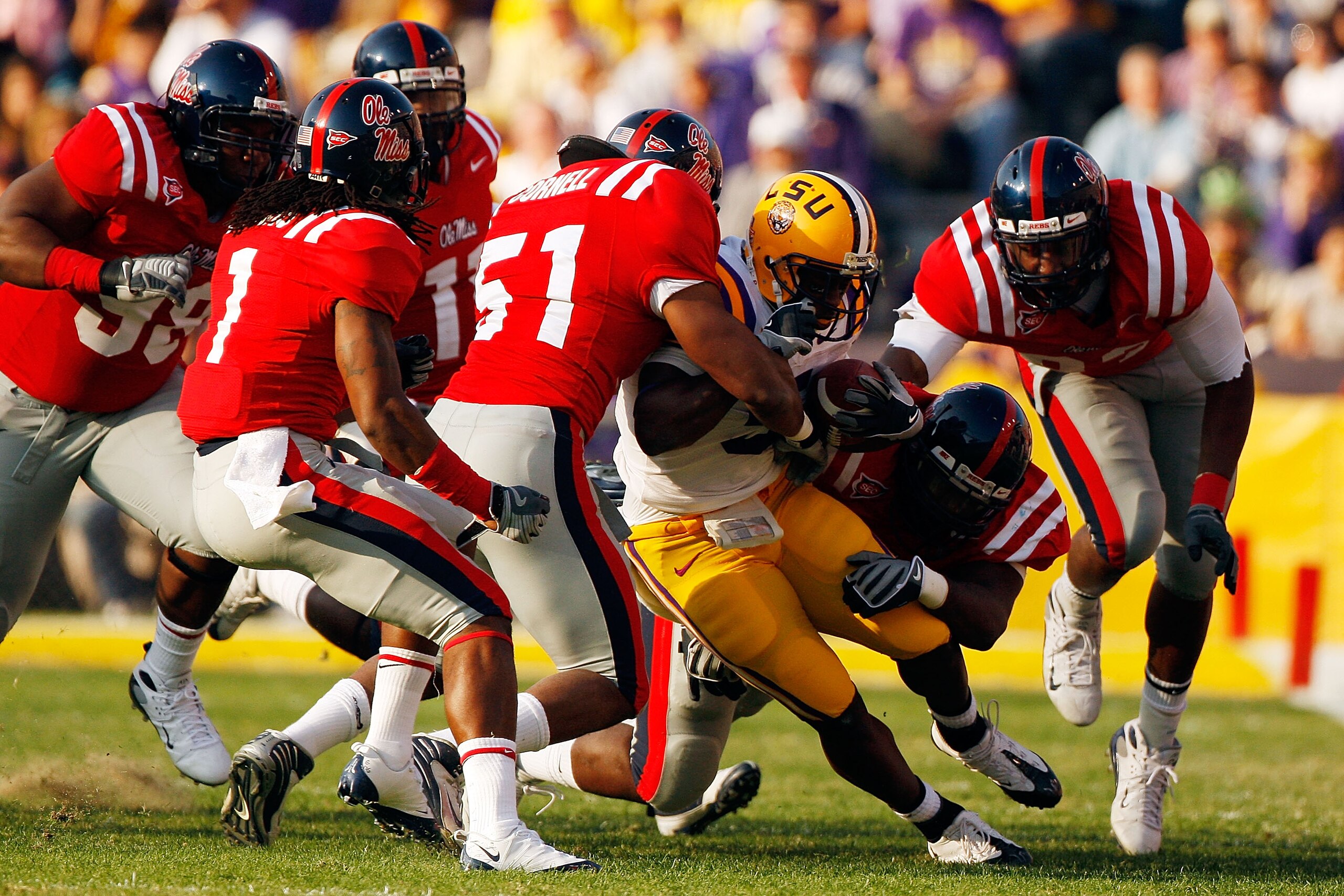BATON ROUGE, LA - NOVEMBER 22: Keiland Williams #5 of the Louisiana State University Tigers is tackled by Jonathan Cornell #51 of the Ole Miss Rebels on November 22, 2008 at Tiger Stadium in Baton Rouge, Louisiana. (Photo by Chris Graythen/Getty Images) BATON ROUGE, LA - NOVEMBER 22: Keiland Williams #5 of the Louisiana State University Tigers is tackled by Jonathan Cornell #51 of the Ole Miss Rebels on November 22, 2008 at Tiger Stadium in Baton Rouge, Louisiana. (Photo by Chris Graythen/Getty Images)